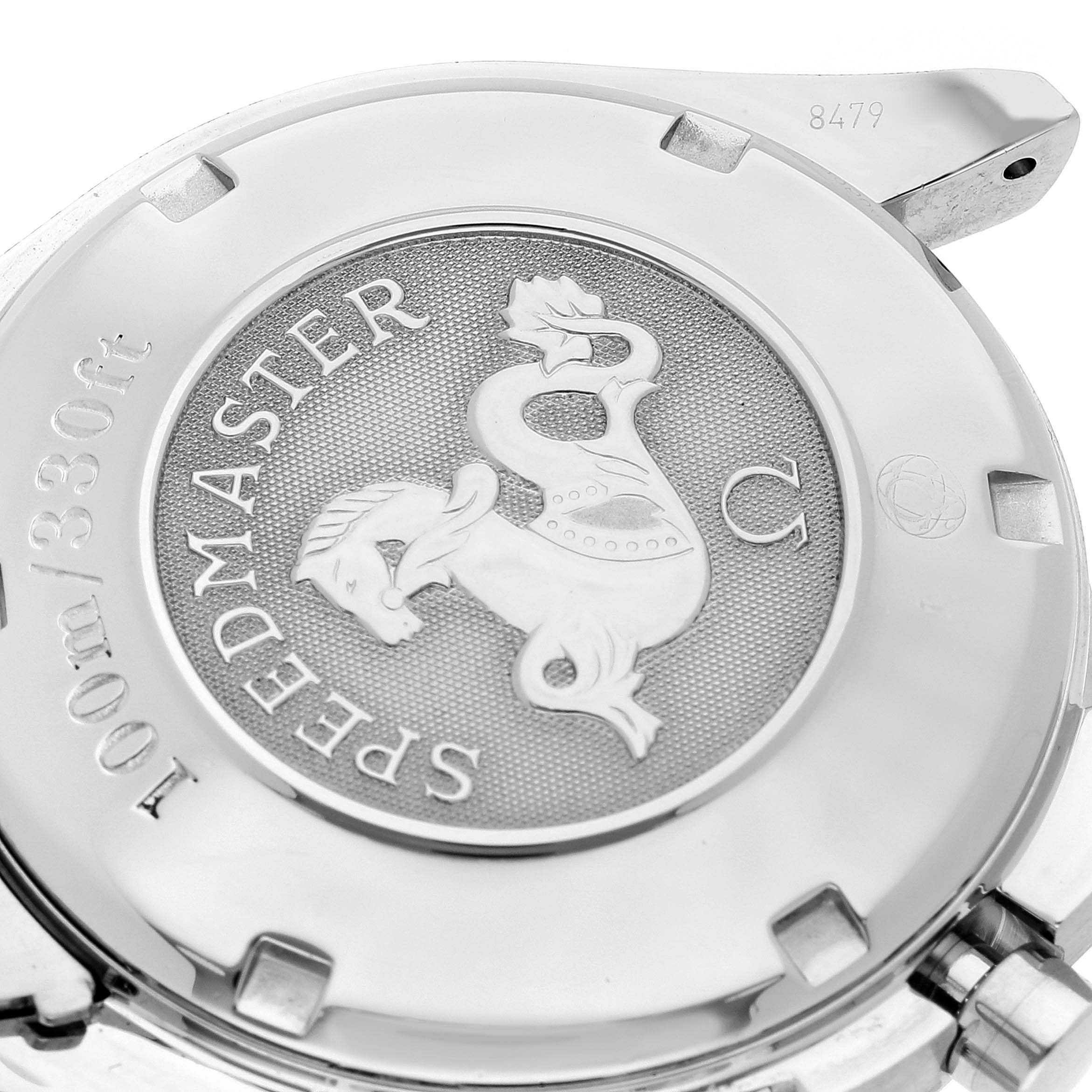 The image shows the back case of an Omega Speedmaster 3210.50.00 Men's Stainless Steel Black Dial 3210.50.00 Men's Stainless Steel Black Dial watch, highlighting the engraved emblem and water resistance details.