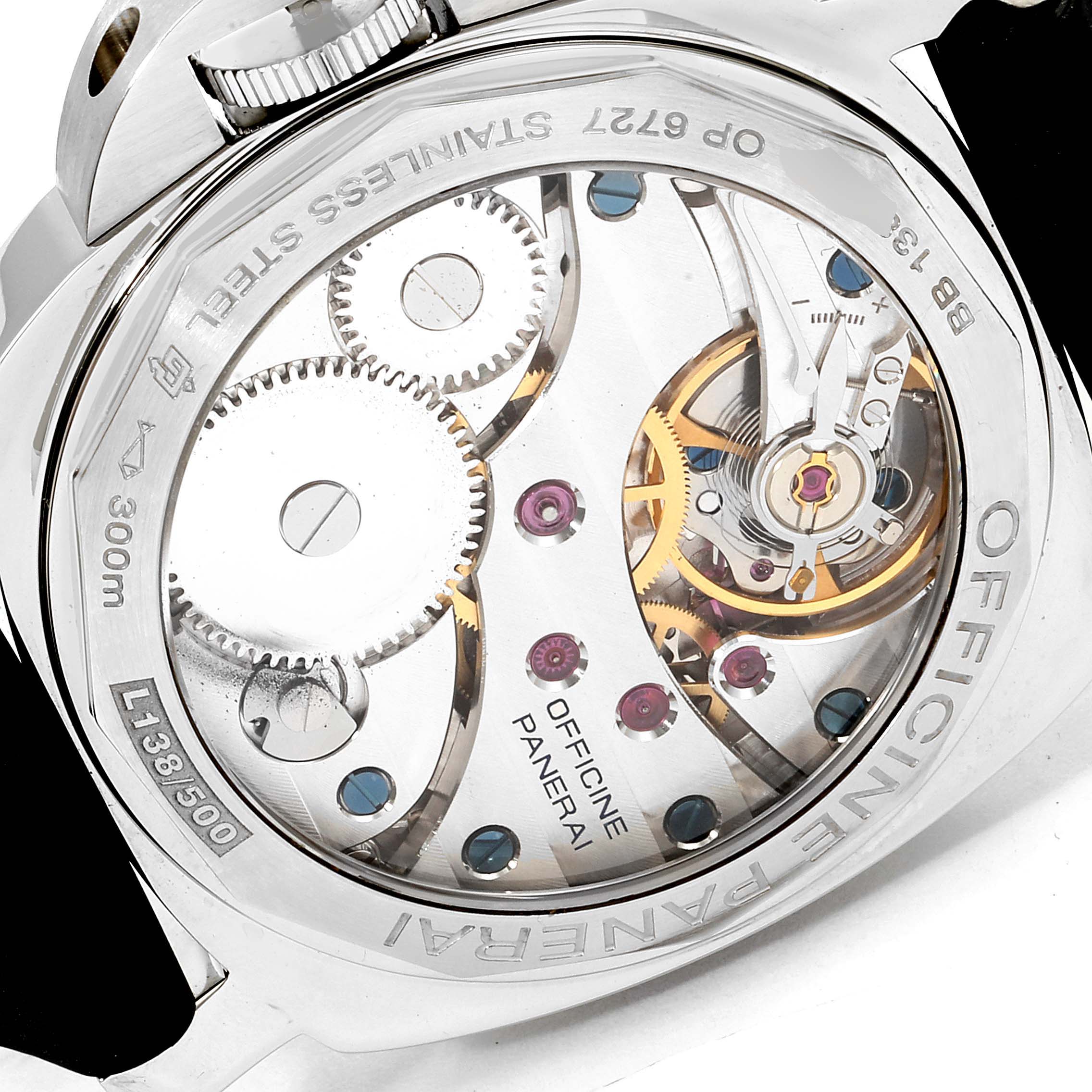 The image shows the back of a Panerai Luminor PAM00113 Men's Stainless Steel White Dial PAM00113 Men's Stainless Steel White Dial watch, highlighting its mechanical movement and internal components.