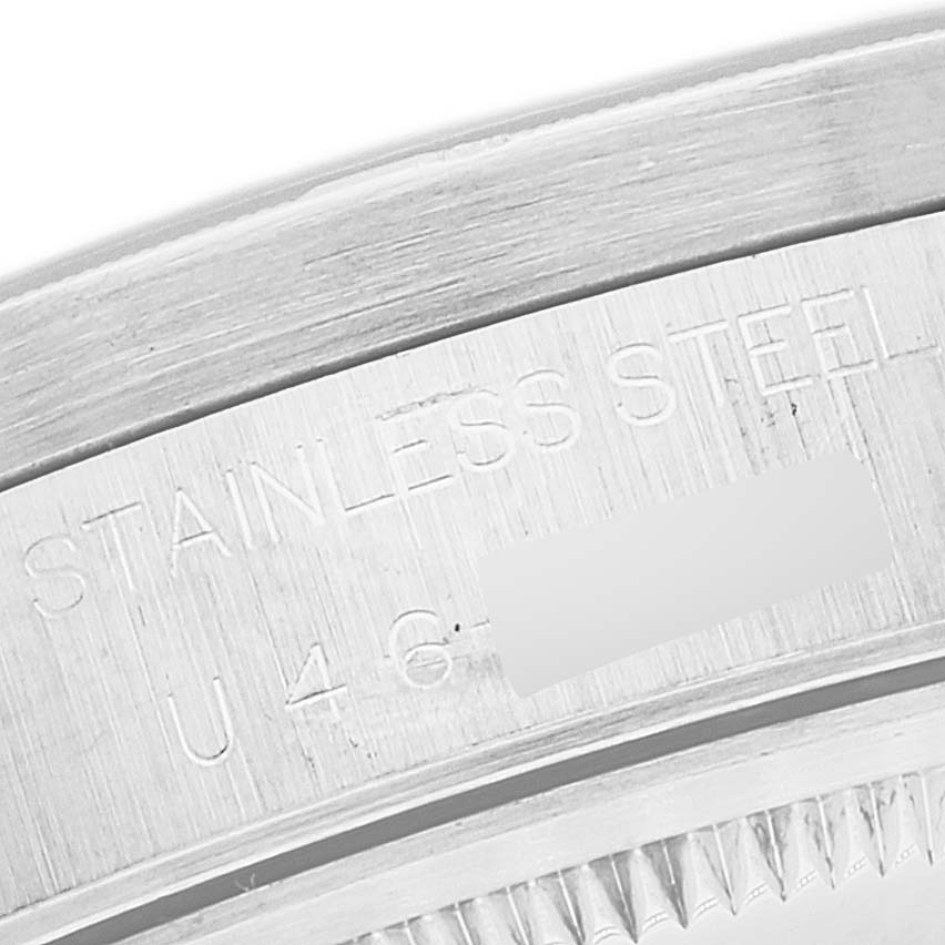 This is a close-up shot of the stainless steel back casing with engravings on the Rolex Air-King 14010 Men's Stainless Steel Pink Dial 14010 Men's Stainless Steel Pink Dial watch.