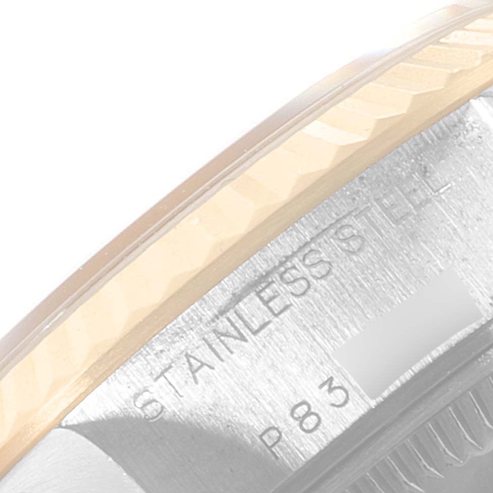 This close-up image shows the stainless steel case side and part of the bezel of a Rolex Datejust 79173 Women
s Steel and Gold (two tone) Silver Dial 79173 Women
s Steel and Gold (two tone) Silver Dial watch.