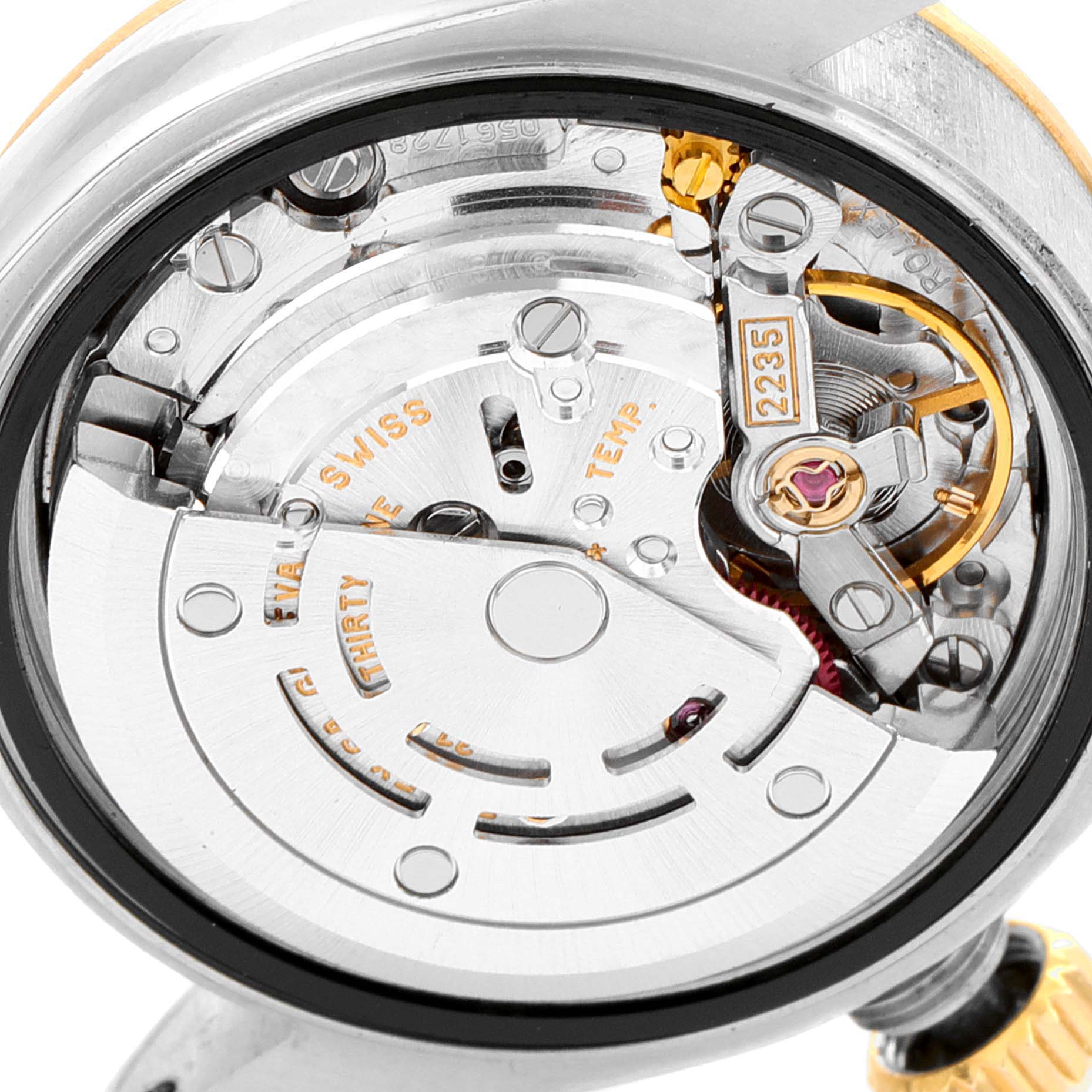 This image shows the intricate inner mechanism and movement of the Rolex Datejust 79173 Women
s Steel and Gold (two tone) Silver Dial 79173 Women
s Steel and Gold (two tone) Silver Dial model watch from a close-up angle.