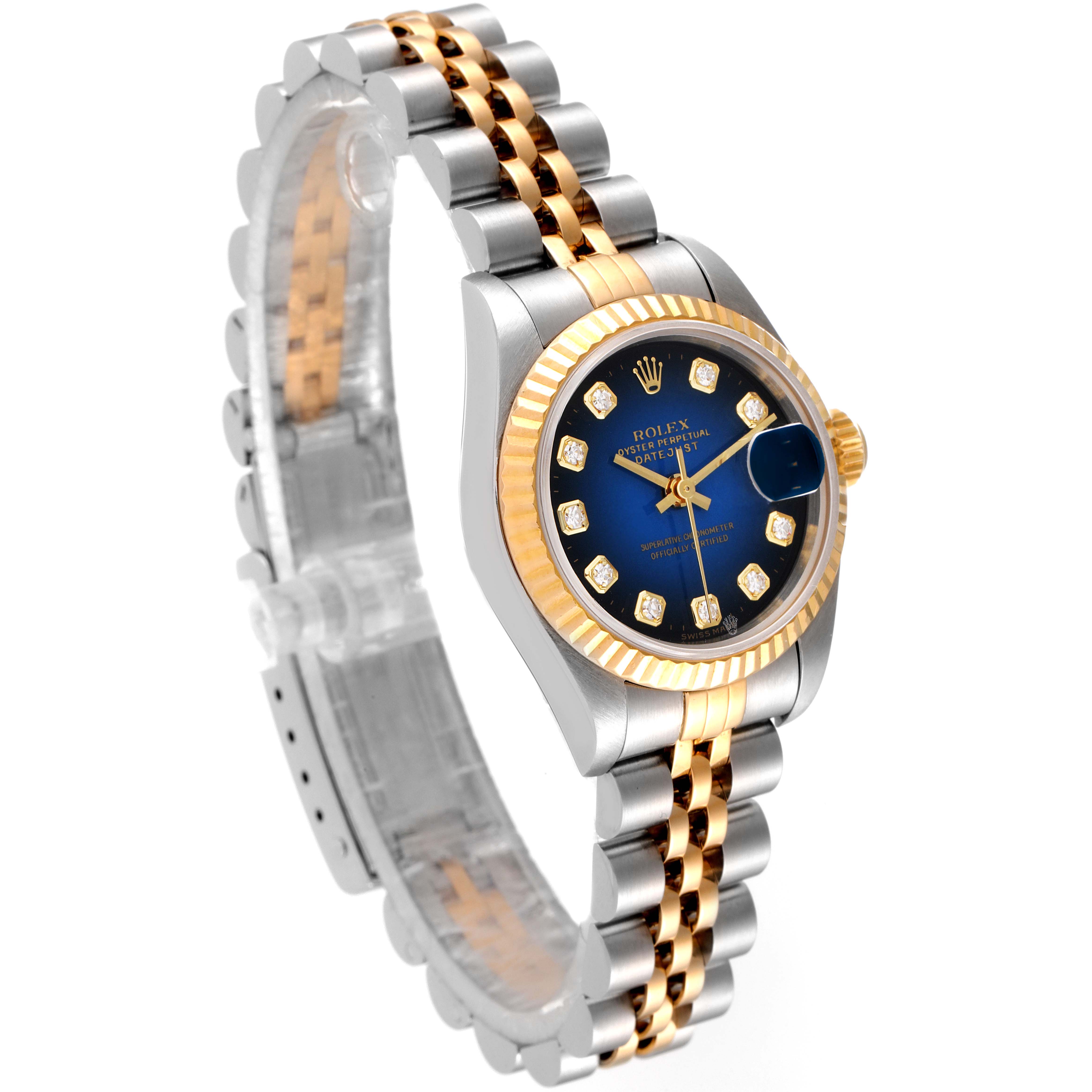 The Rolex Datejust 69173 Women's Steel and Gold (two tone) Blue Dial 69173 Women's Steel and Gold (two tone) Blue Dial watch is shown at an angle showcasing its bracelet, clasp, dial, bezel, and crown.