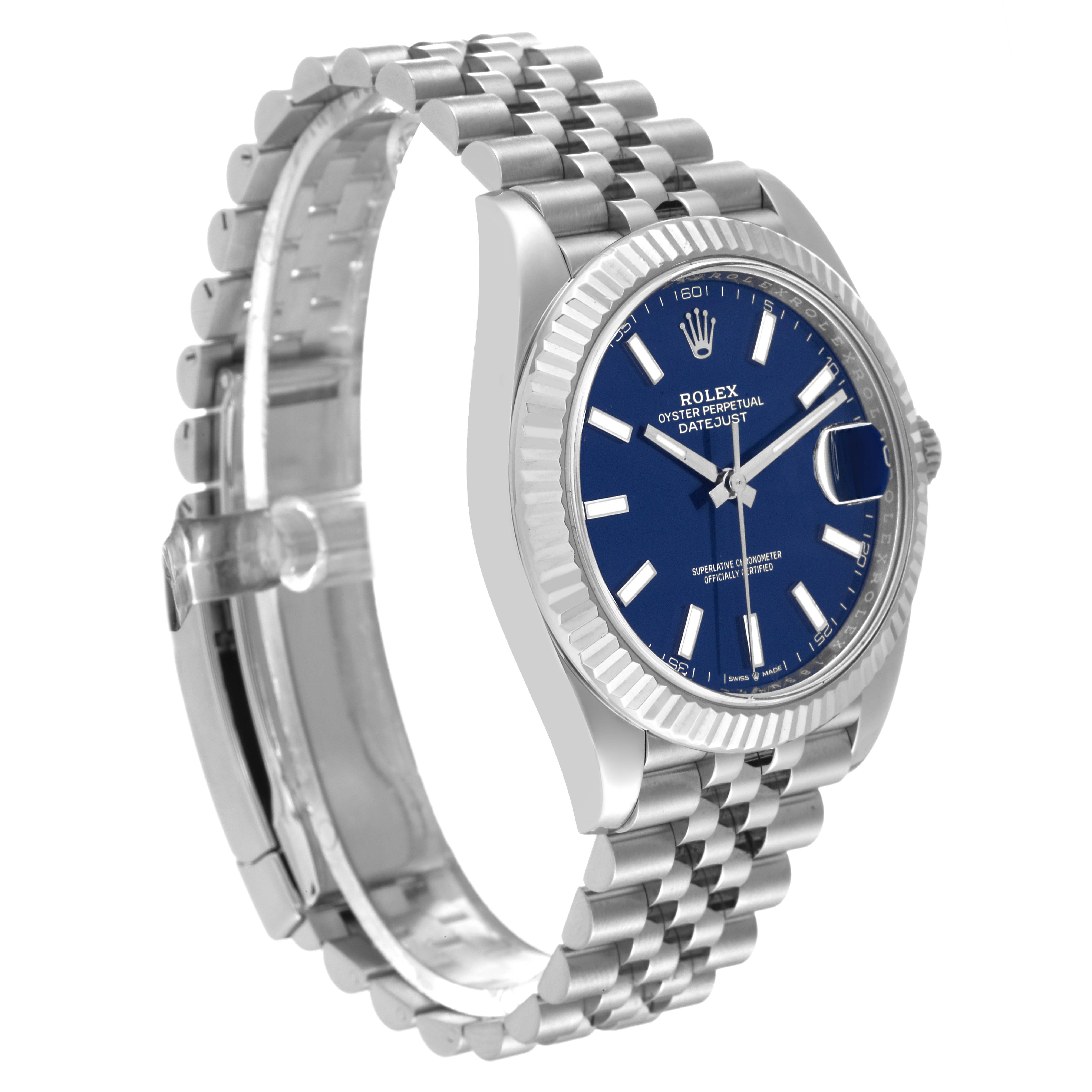 The Rolex Datejust 41 126334 Men's Stainless Steel Blue Dial 126334 Men's Stainless Steel Blue Dial watch is shown at an angle, displaying the blue dial, fluted bezel, and Jubilee bracelet.