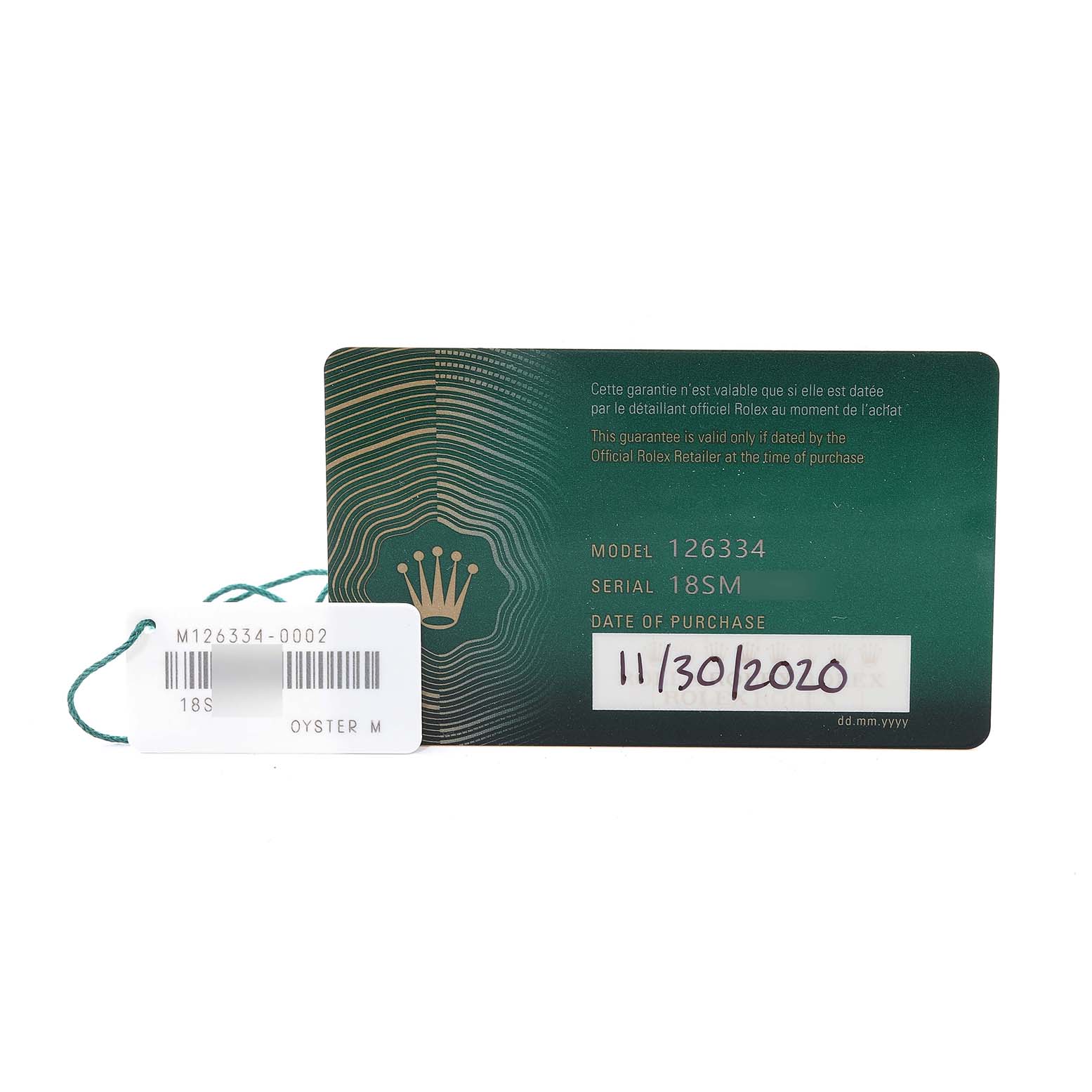 The image shows the warranty card and tag for a Rolex Datejust 41 126334 Men's Stainless Steel Blue Dial 126334 Men's Stainless Steel Blue Dial model 126334, including the serial number and purchase date.