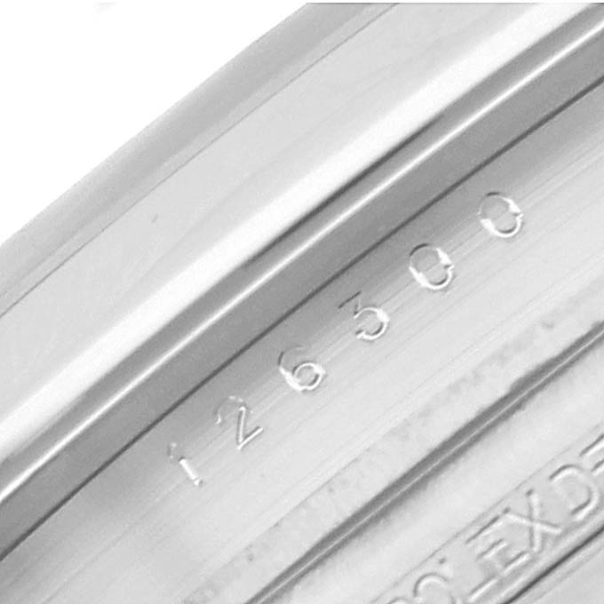 The image shows a close-up of the case and reference number "126300" engraved on the Rolex Datejust 41 116300 Men's Stainless Steel Blue Dial 116300 Men's Stainless Steel Blue Dial model.