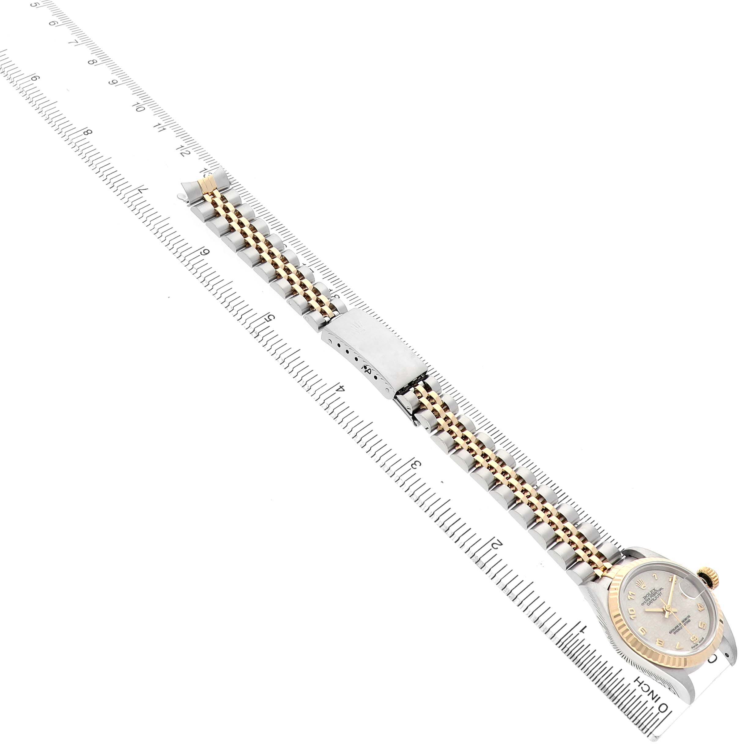 The Rolex Datejust 69173 Women's Steel and Gold (two tone) White Dial watch is shown from an angled overhead view, highlighting the dial, case, and full bracelet.