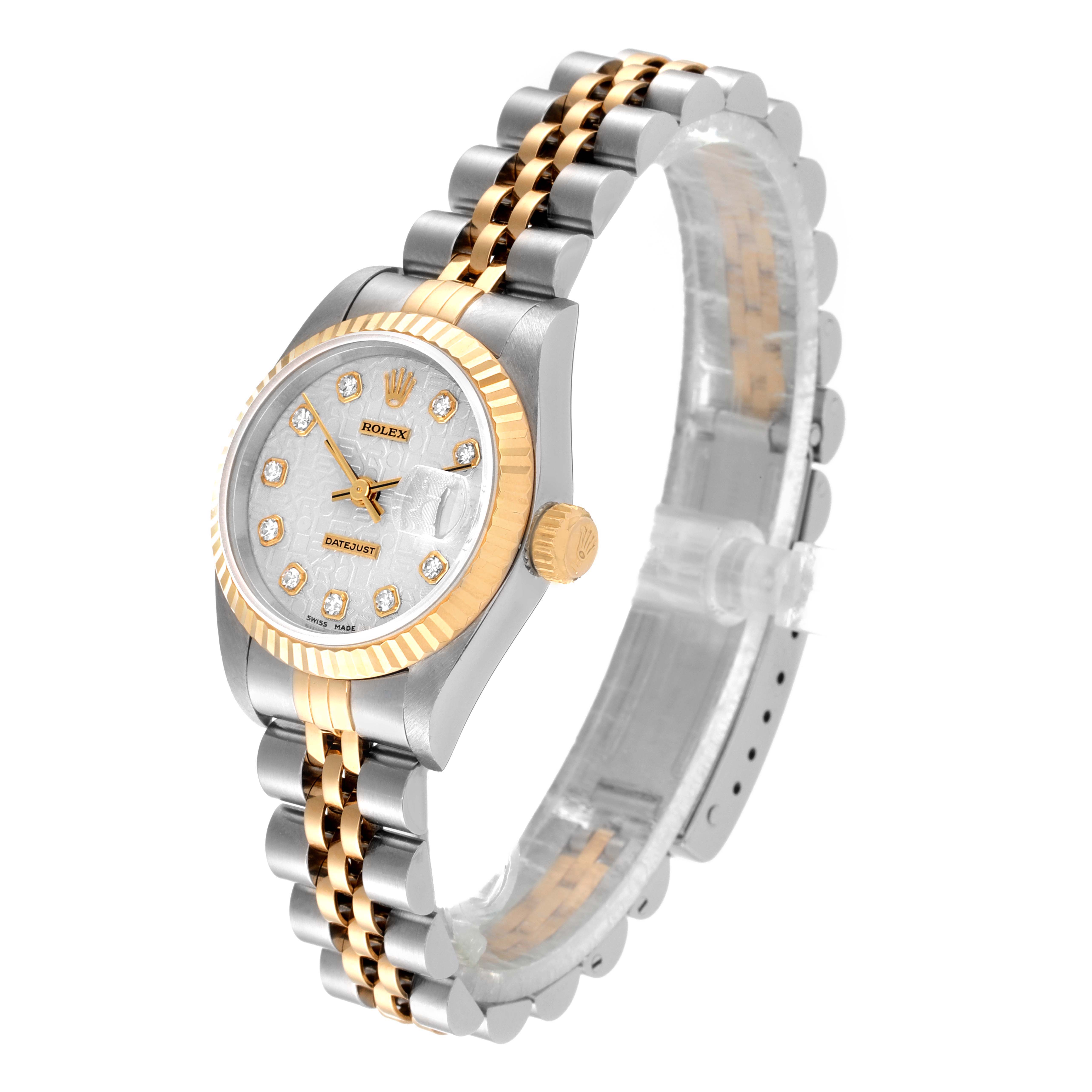 This image shows a Rolex Datejust 69173 Women
s Steel and Gold (two tone) Silver Dial 69173 Women
s Steel and Gold (two tone) Silver Dial watch at a three-quarter angle, highlighting the face, bezel, and two-tone bracelet.