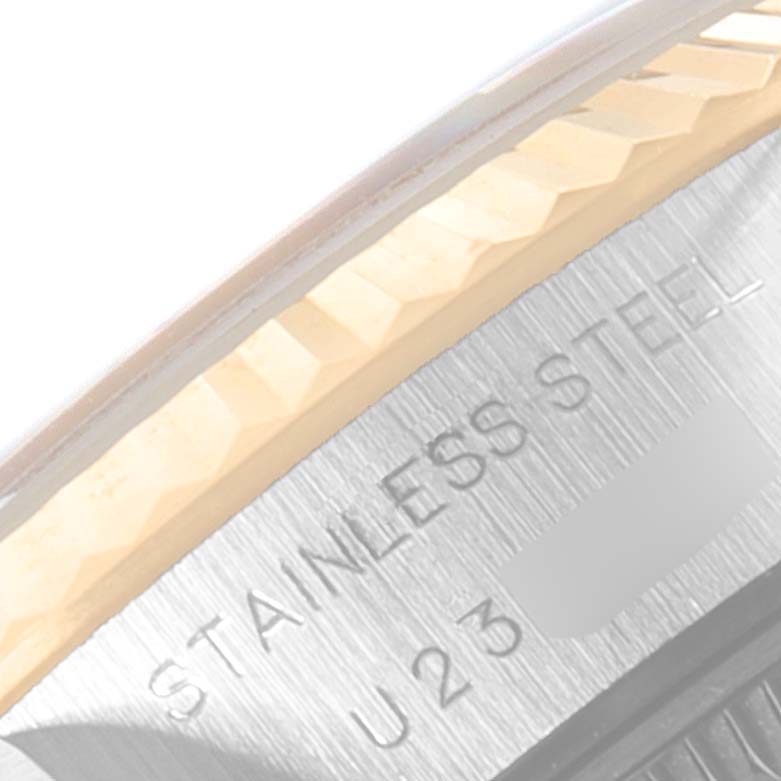 This image shows a close-up of the side and bezel of a Rolex Datejust 69173 Women
s Steel and Gold (two tone) Silver Dial 69173 Women
s Steel and Gold (two tone) Silver Dial watch, specifically highlighting the stainless steel component.