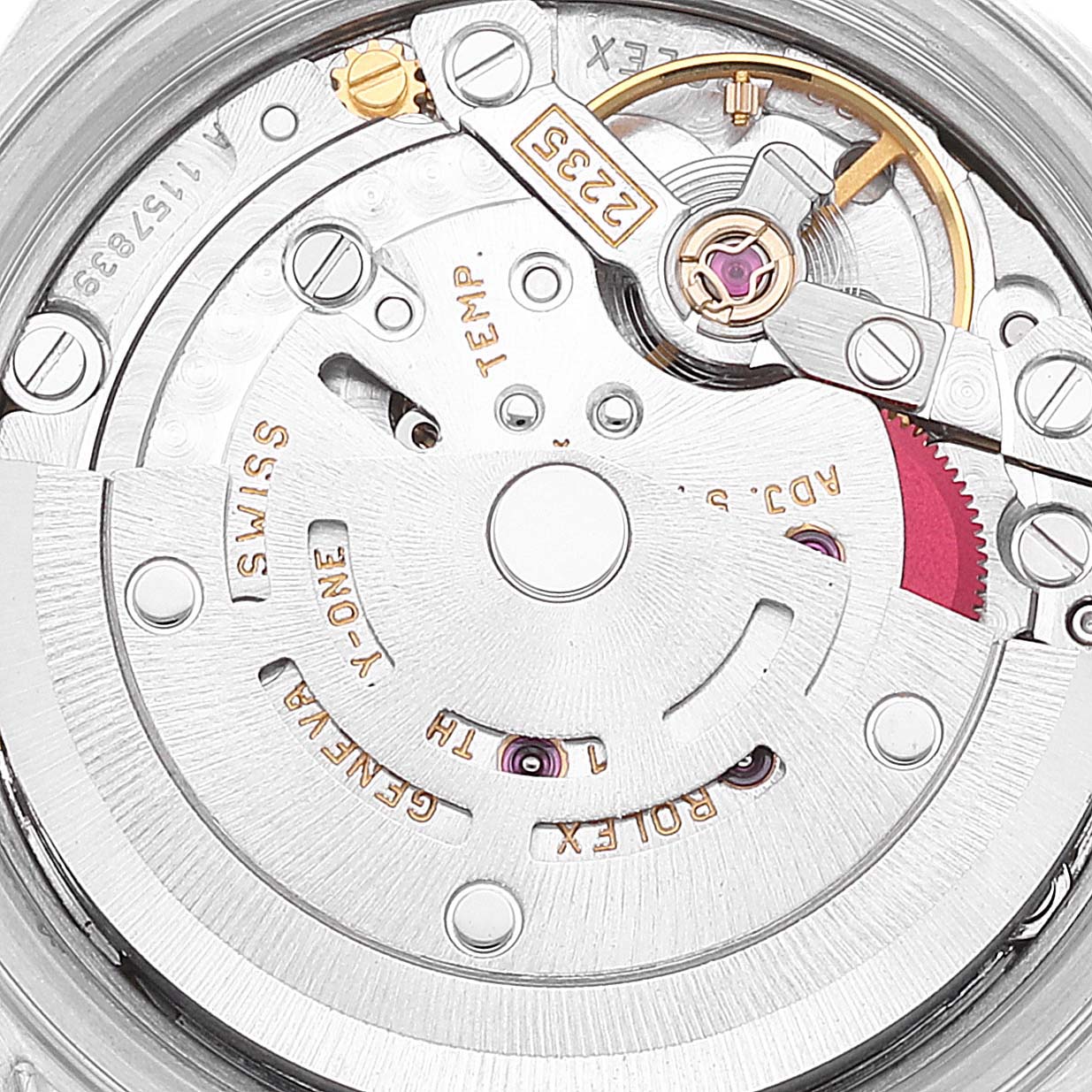 This is a close-up view of the movement inside a Rolex Datejust 79173 Women's Steel and Gold (two tone) Champagne Dial 79173 Women's Steel and Gold (two tone) Champagne Dial watch, highlighting the intricate mechanical components and inscriptions.