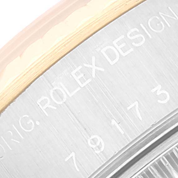 The image shows a close-up of the case side and model number engraving on a Rolex Datejust 79173 Women's Steel and Gold (two tone) Champagne Dial 79173 Women's Steel and Gold (two tone) Champagne Dial watch.