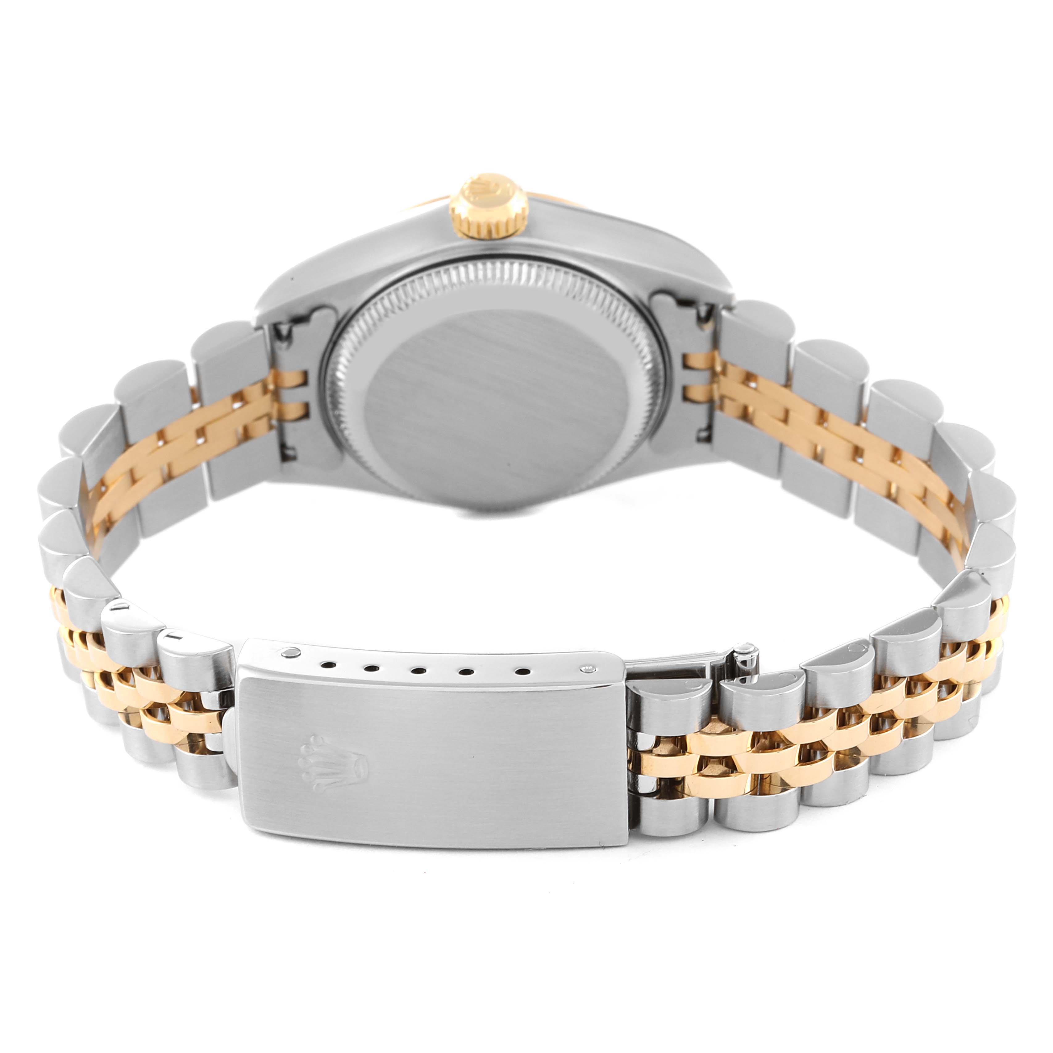 The image shows the back view of a Rolex Datejust 79173 Women's Steel and Gold (two tone) Champagne Dial 79173 Women's Steel and Gold (two tone) Champagne Dial, highlighting its case back and two-tone Jubilee bracelet with clasp.
