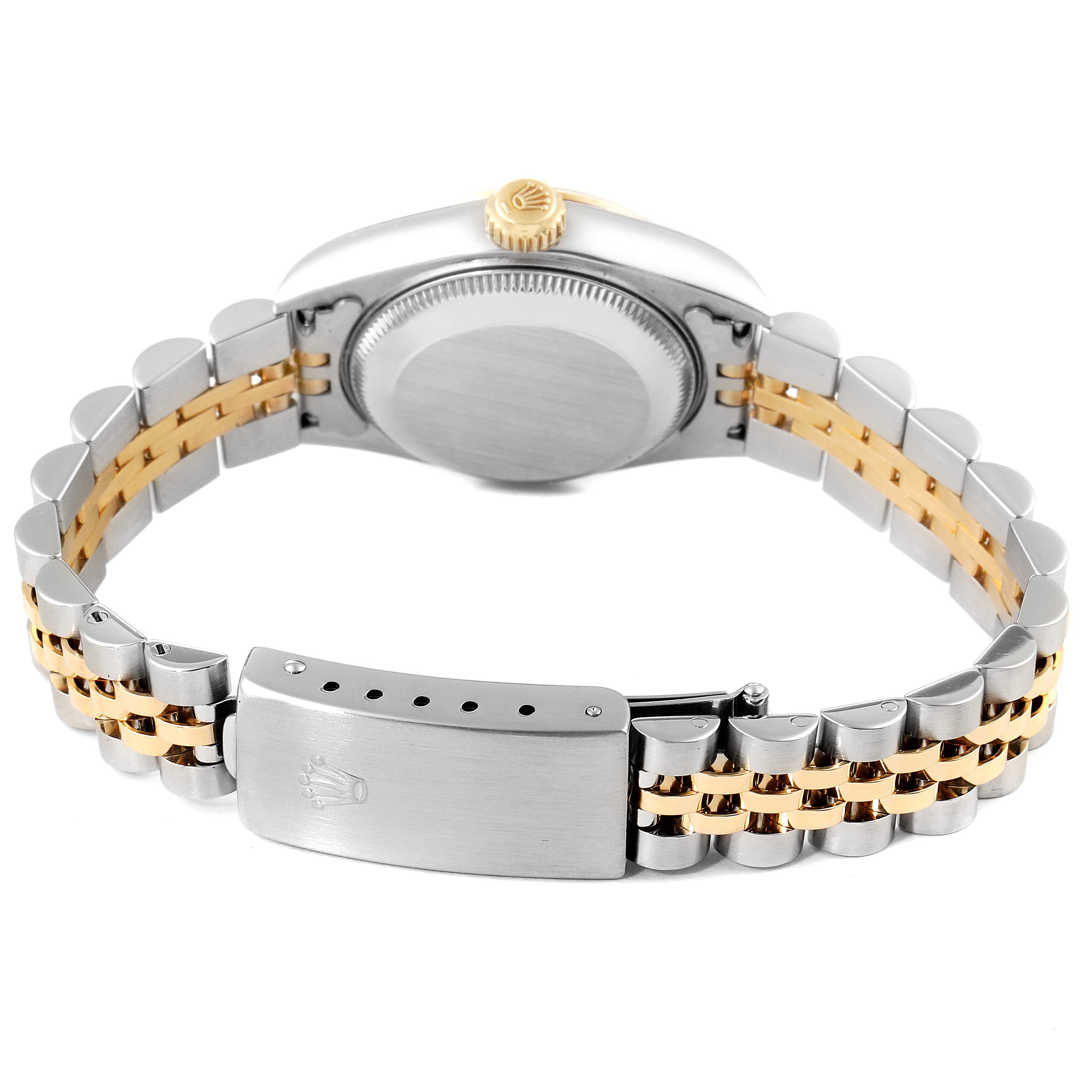 The image shows the back case and bracelet clasp of a Rolex Datejust 79163 Women's Steel and Gold (two tone) Mother of Pearl Dial 79163 Women's Steel and Gold (two tone) Mother of Pearl Dial watch.