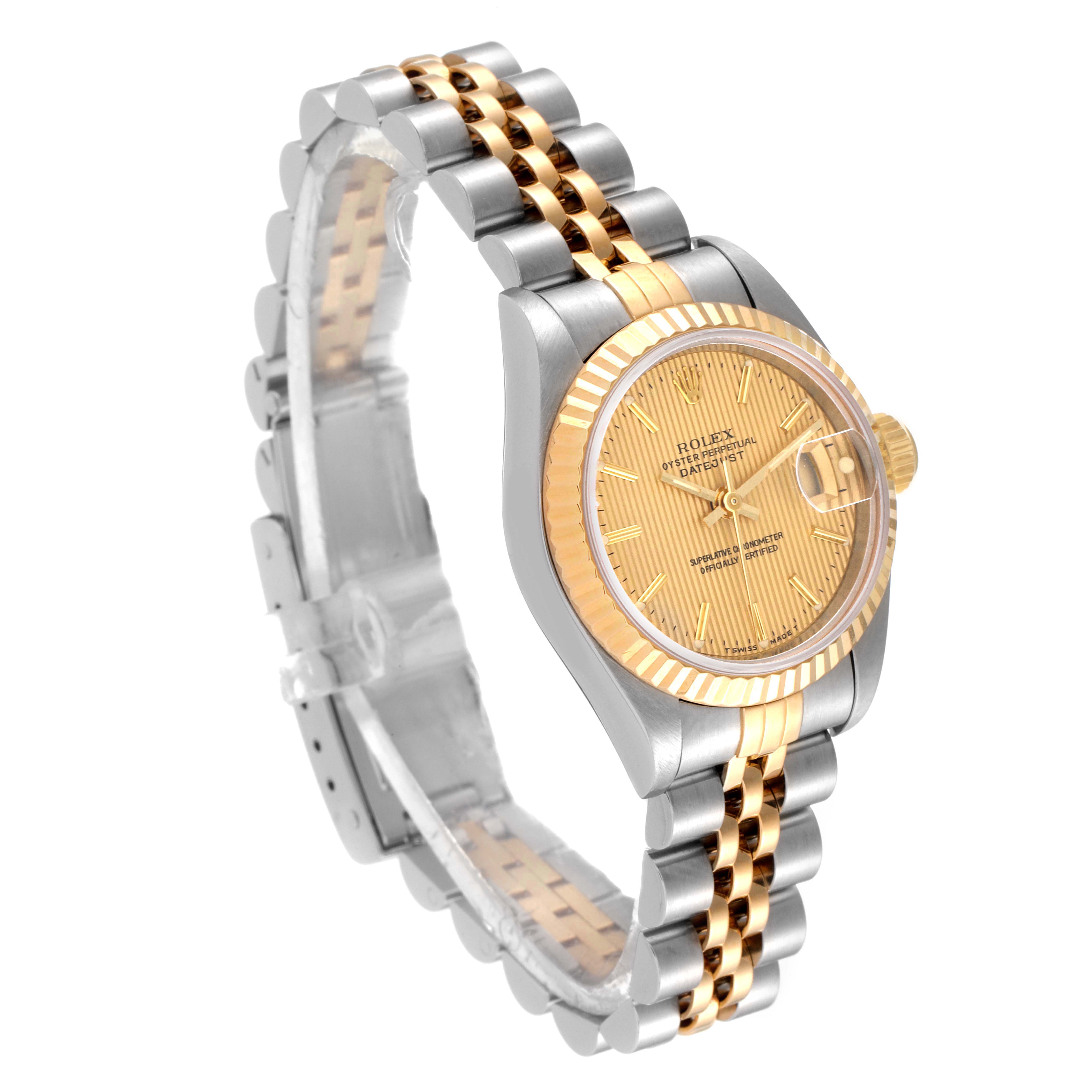 This Rolex Datejust 69173 Women
s Steel and Gold (two tone) Champagne Dial 69173 Women
s Steel and Gold (two tone) Champagne Dial watch is shown from a 3/4 angle displaying the case, face, bezel, and two-tone bracelet.