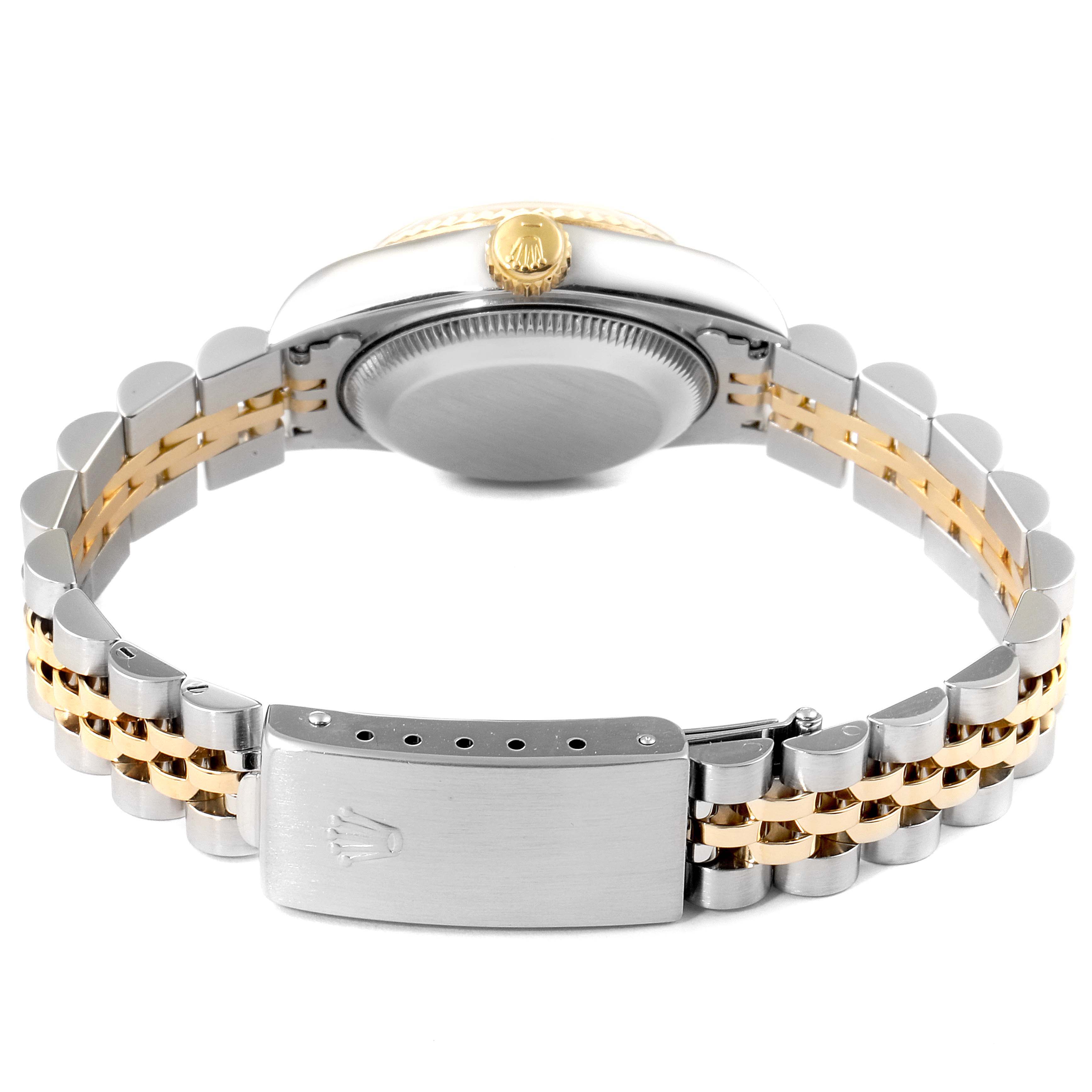 This image shows the back case and bracelet of a Rolex Datejust 69173 Women's Steel and Gold (two tone) White Dial 69173 Women's Steel and Gold (two tone) White Dial watch, featuring a clasp and partial view of the crown.