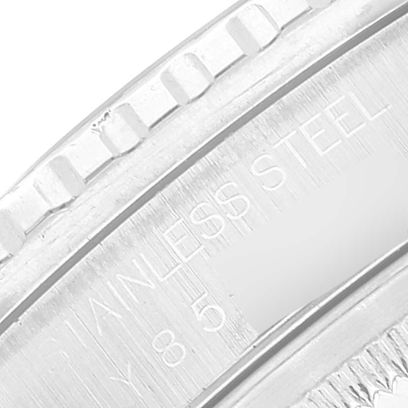 This close-up image shows part of the bezel and inner ring of the Rolex Turn-o-Graph 16264 Men's Stainless Steel Blue Dial 16264 Men's Stainless Steel Blue Dial watch with inscriptions.