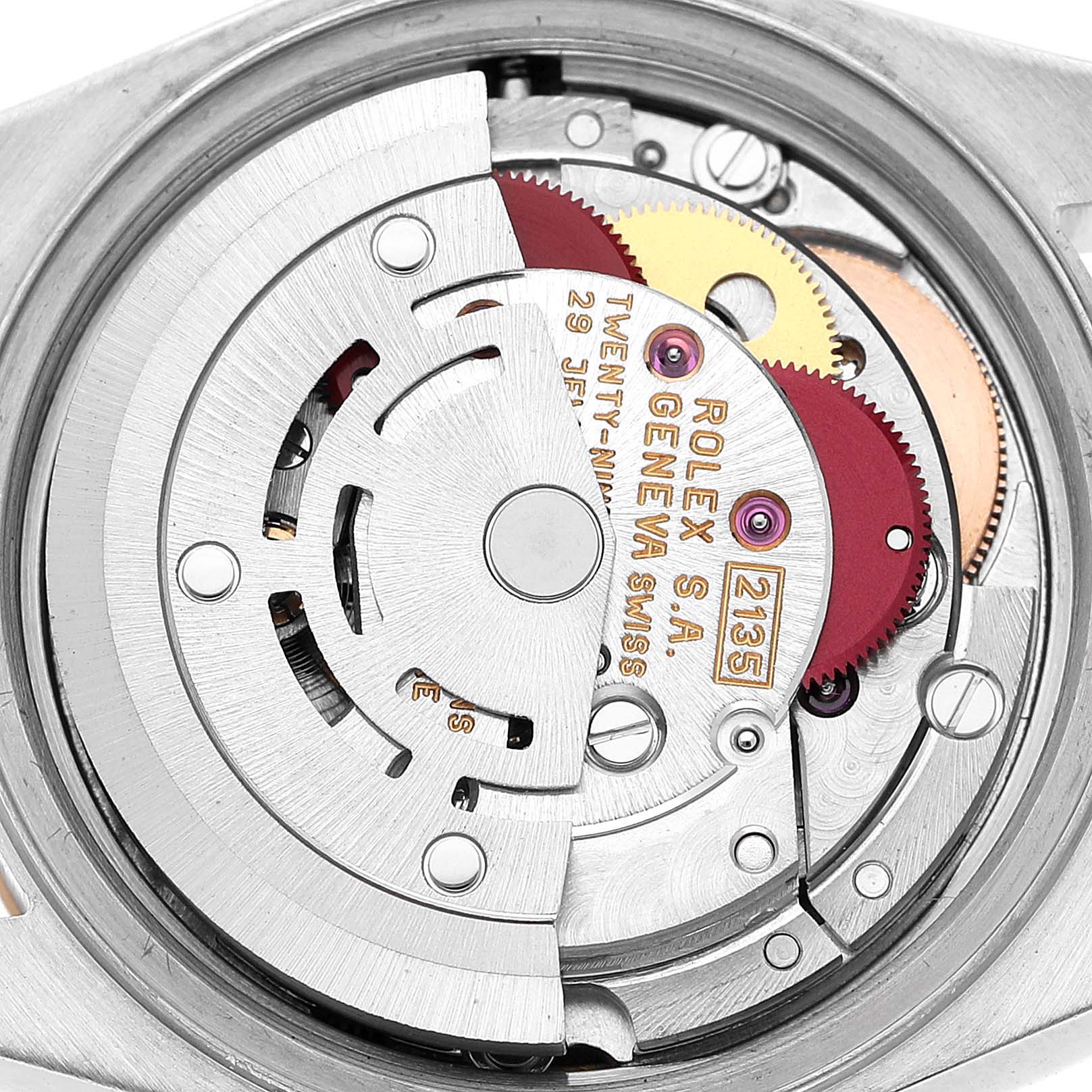 The image shows a close-up of the Rolex Datejust 69173 Women's Steel and Gold (two tone) White Dial movement, highlighting the rotor and gear components.