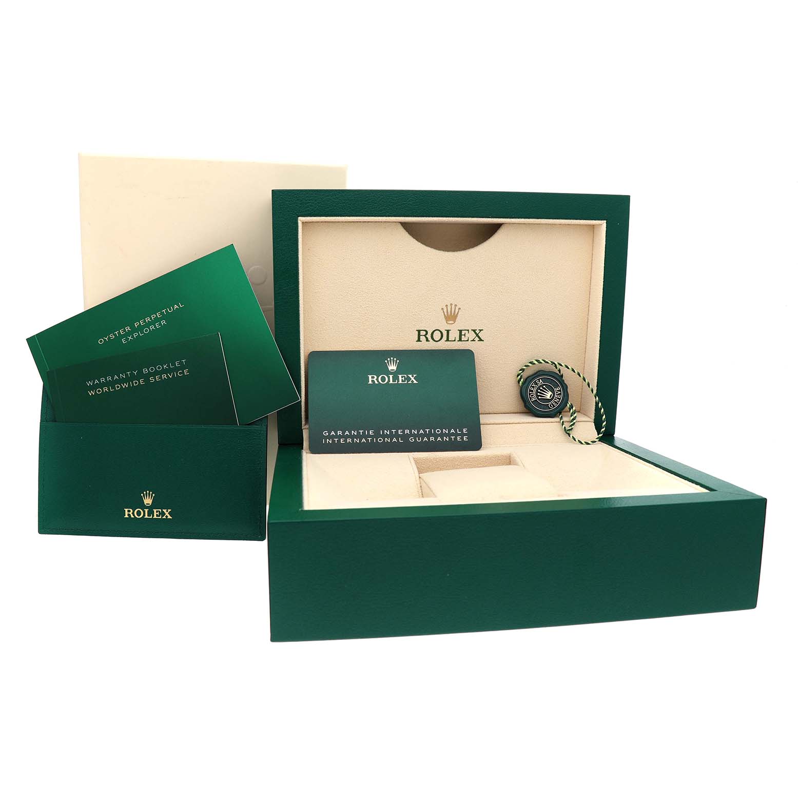 The image shows the packaging and accessories for a Rolex Explorer 124270 Men's Stainless Steel Black Dial, including the box, guarantee card, and booklets.