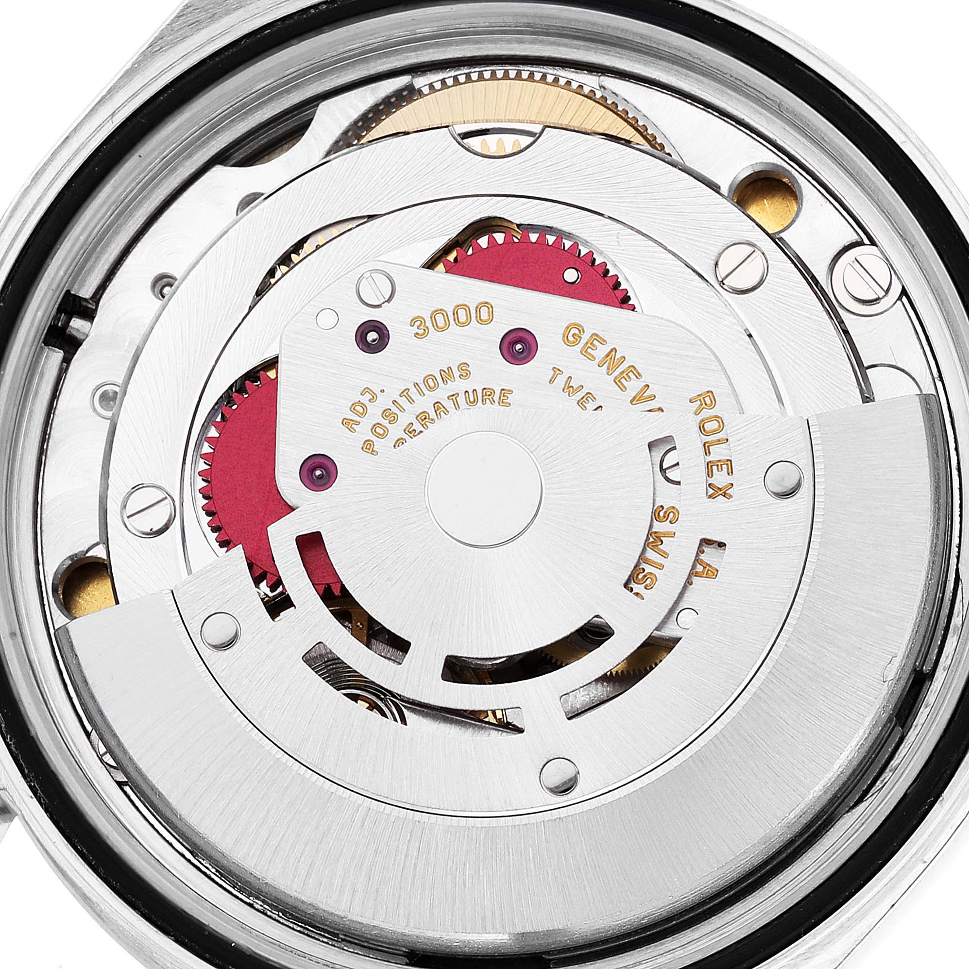 The image shows a detailed view of the movement mechanism inside a Rolex Explorer 14270 Men
s Stainless Steel Black Dial 14270 Men
s Stainless Steel Black Dial watch.