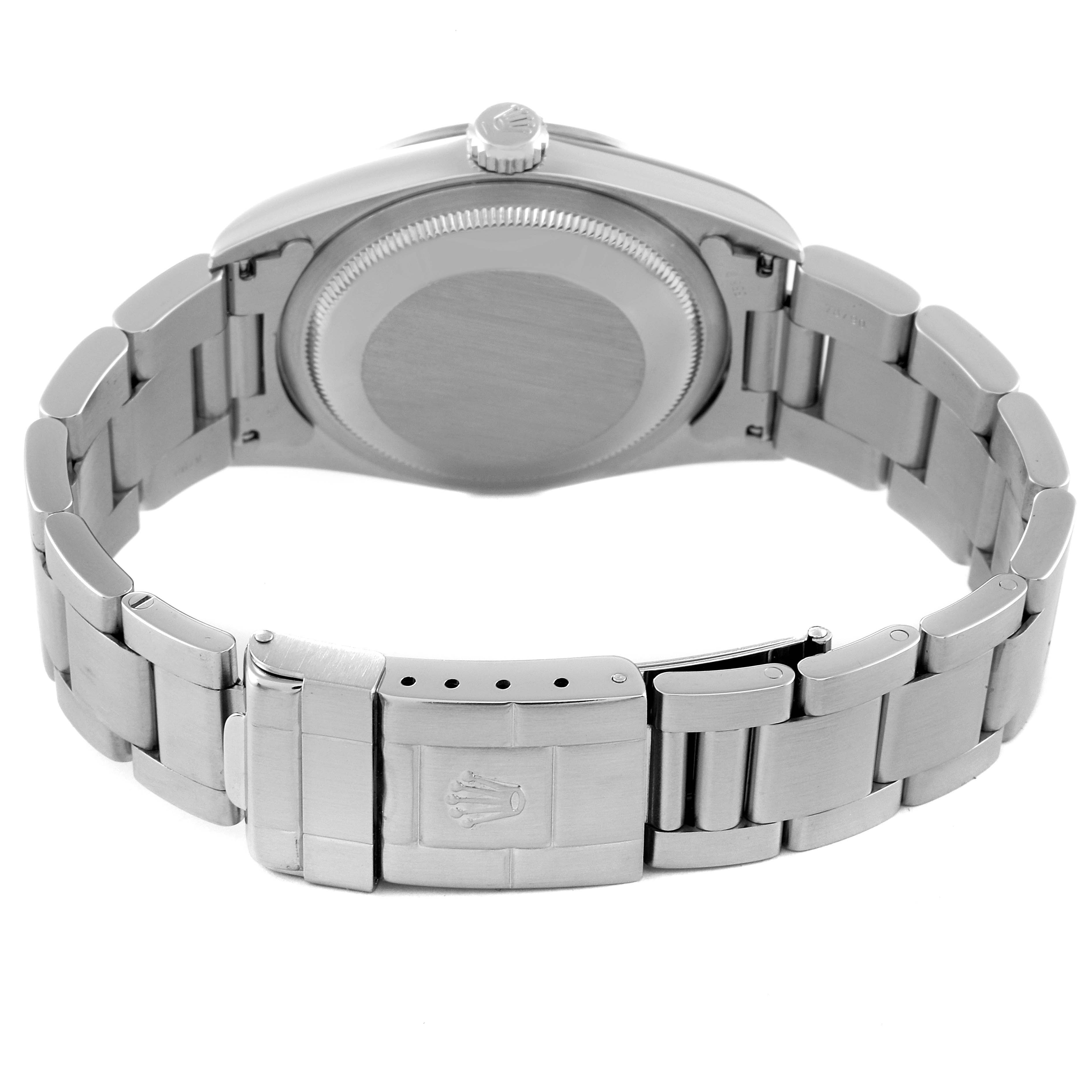 The image shows the case back and bracelet clasp of a Rolex Explorer 14270 Men
s Stainless Steel Black Dial 14270 Men
s Stainless Steel Black Dial watch from a rear angle.