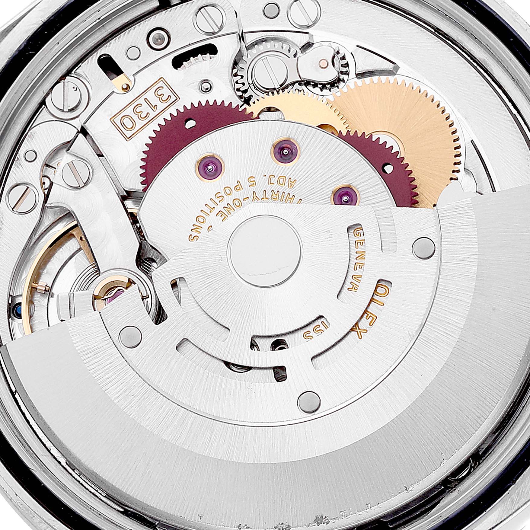 The image shows the intricate internal mechanics of a Rolex Explorer 114270 Men
s Stainless Steel Black Dial 114270 Men
s Stainless Steel Black Dial watch, focusing on the movement and gears.