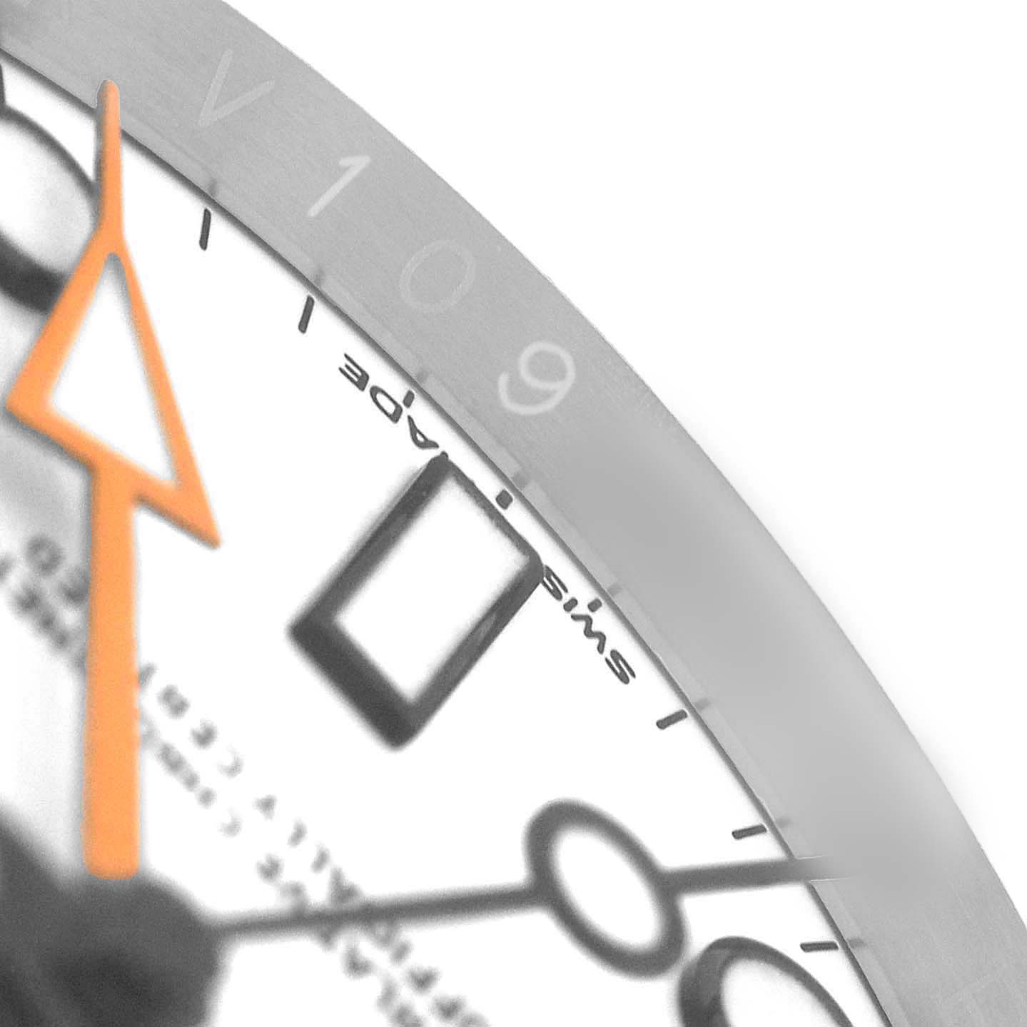 The image shows a close-up of the Rolex Explorer 216570 Men's Stainless Steel White Dial's dial, hands, and part of the bezel at an angled view.