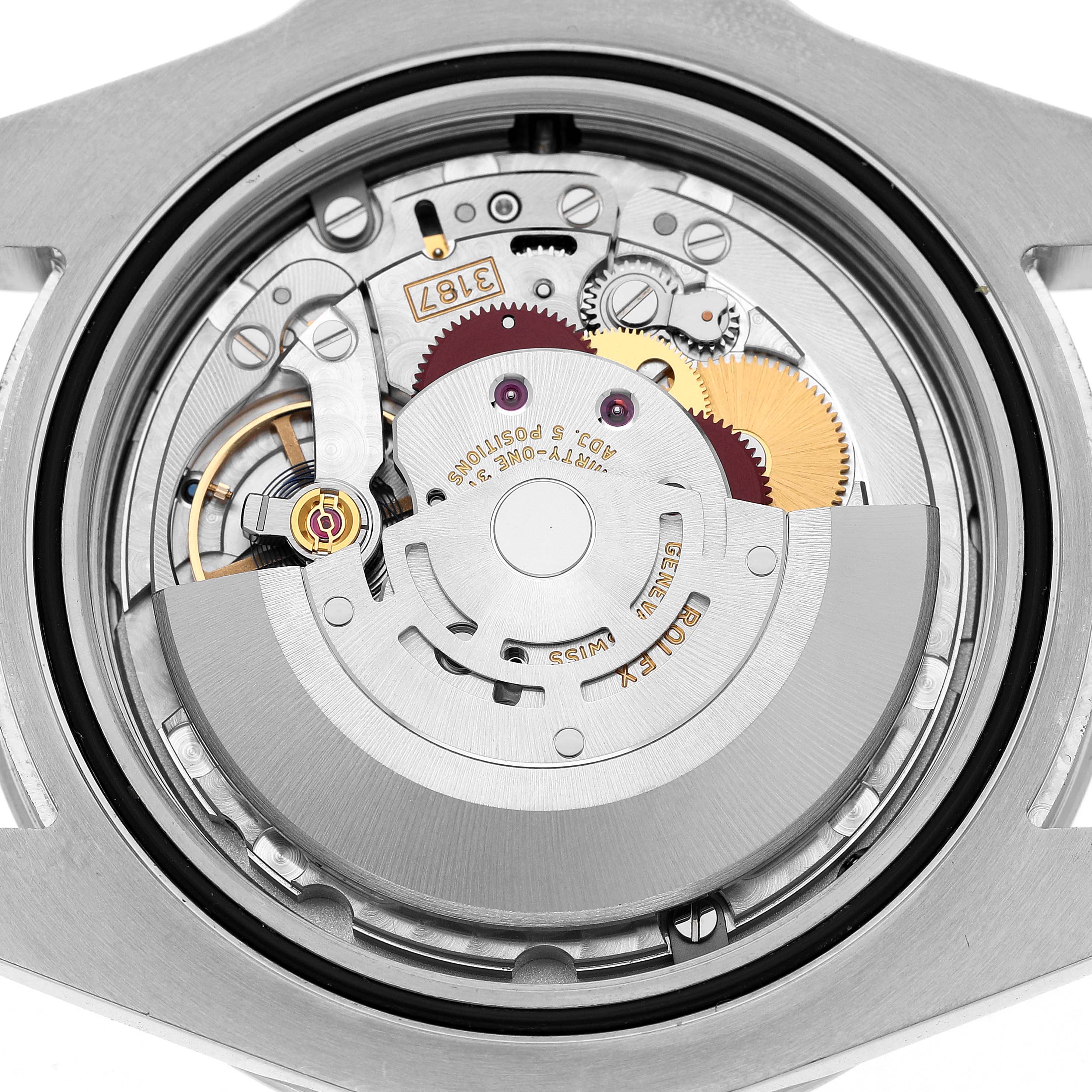 The image shows the movement of a Rolex Explorer 216570 Men's Stainless Steel White Dial watch from the back, displaying gears, rotor, and various components.