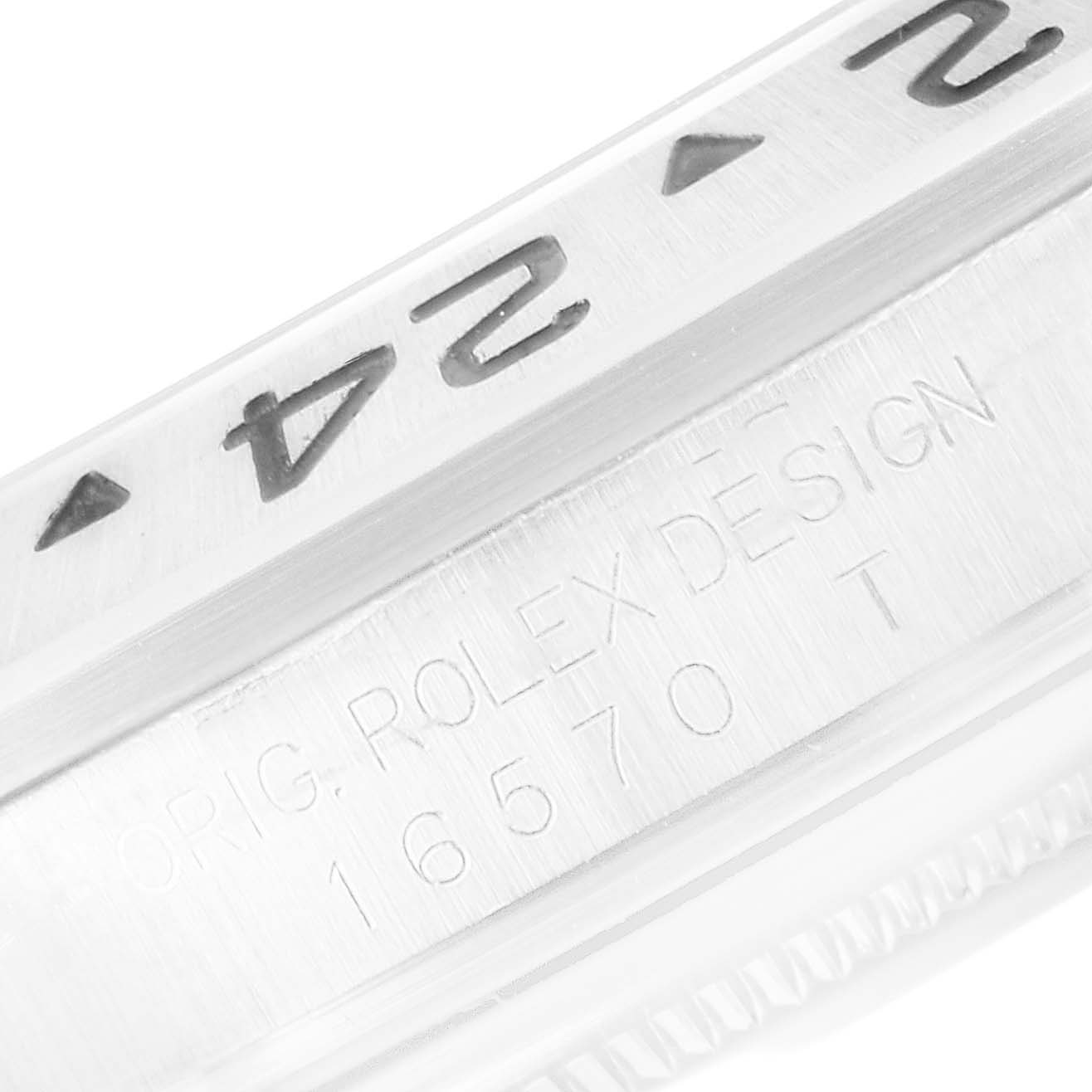 This image shows a close-up of the bezel and engraved case side of the Rolex Explorer 16570 Men
s Stainless Steel Black Dial 16570 Men
s Stainless Steel Black Dial watch model.