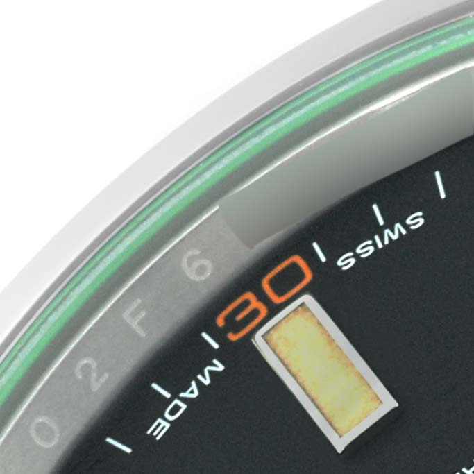 The image shows a close-up of the dial of a Rolex Milgauss 116400 Men's Stainless Steel Black Dial 116400 Men's Stainless Steel Black Dial watch, focusing on the "30" minute marker and "Swiss Made" text.
