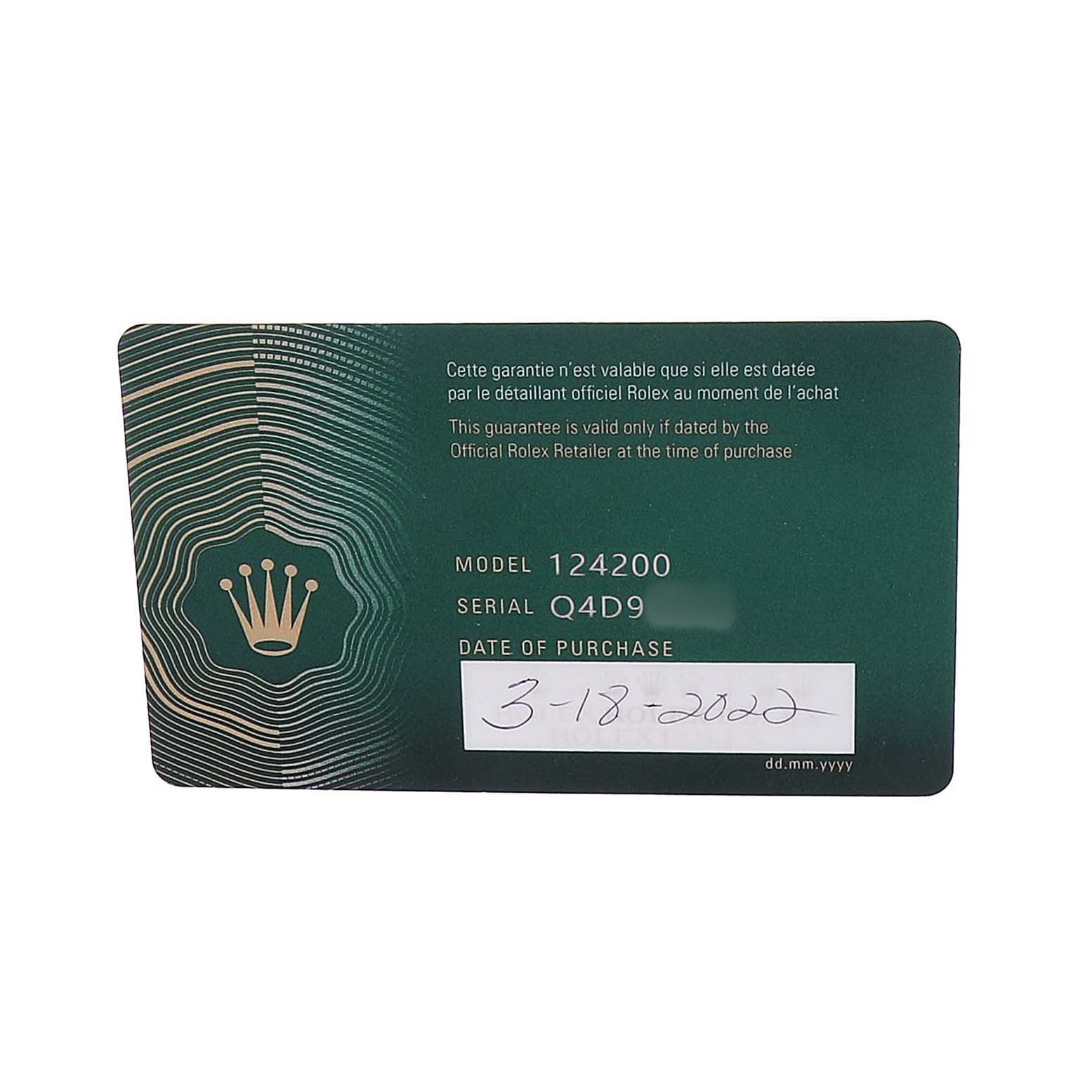 The image shows a warranty card for a Rolex Oyster Perpetual 124200 Men's Stainless Steel Blue Dial, displaying model, serial number, and purchase date details.