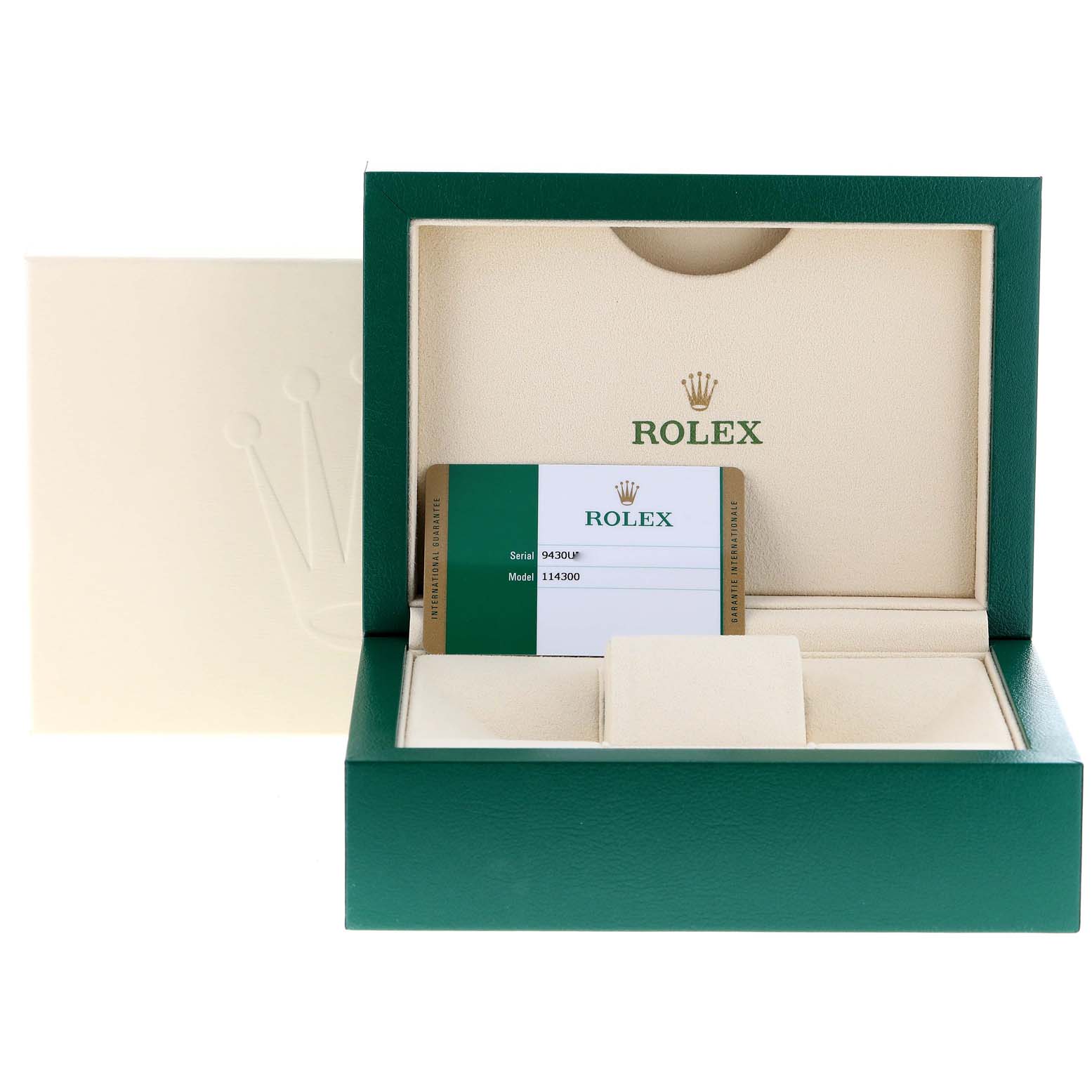 The image shows a Rolex Oyster Perpetual 114300 Men's Stainless Steel Grey Dial 114300 Men's Stainless Steel Grey Dial watch box, with an authenticity card partially inserted inside.