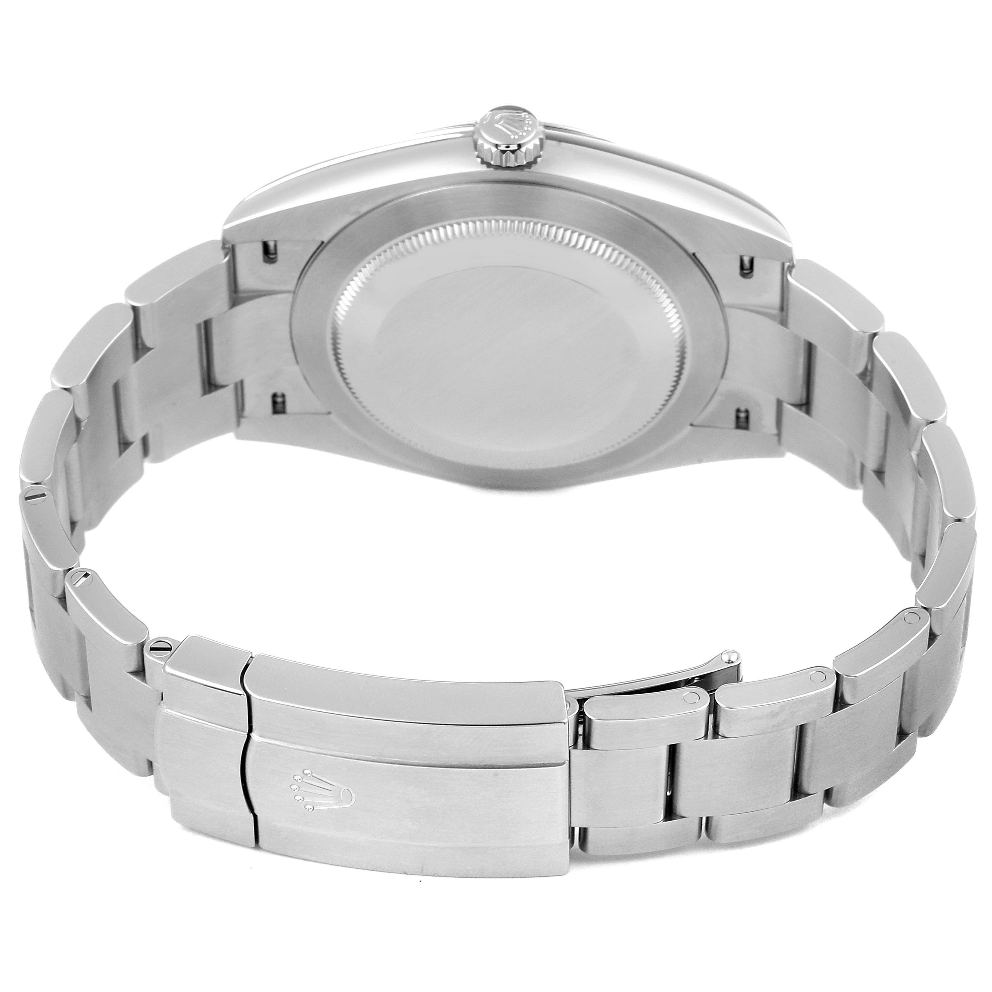 The image shows the back case and bracelet of a Rolex Oyster Perpetual 124300 Men
s Stainless Steel Black Dial 124300 Men
s Stainless Steel Black Dial watch from a rear angle.