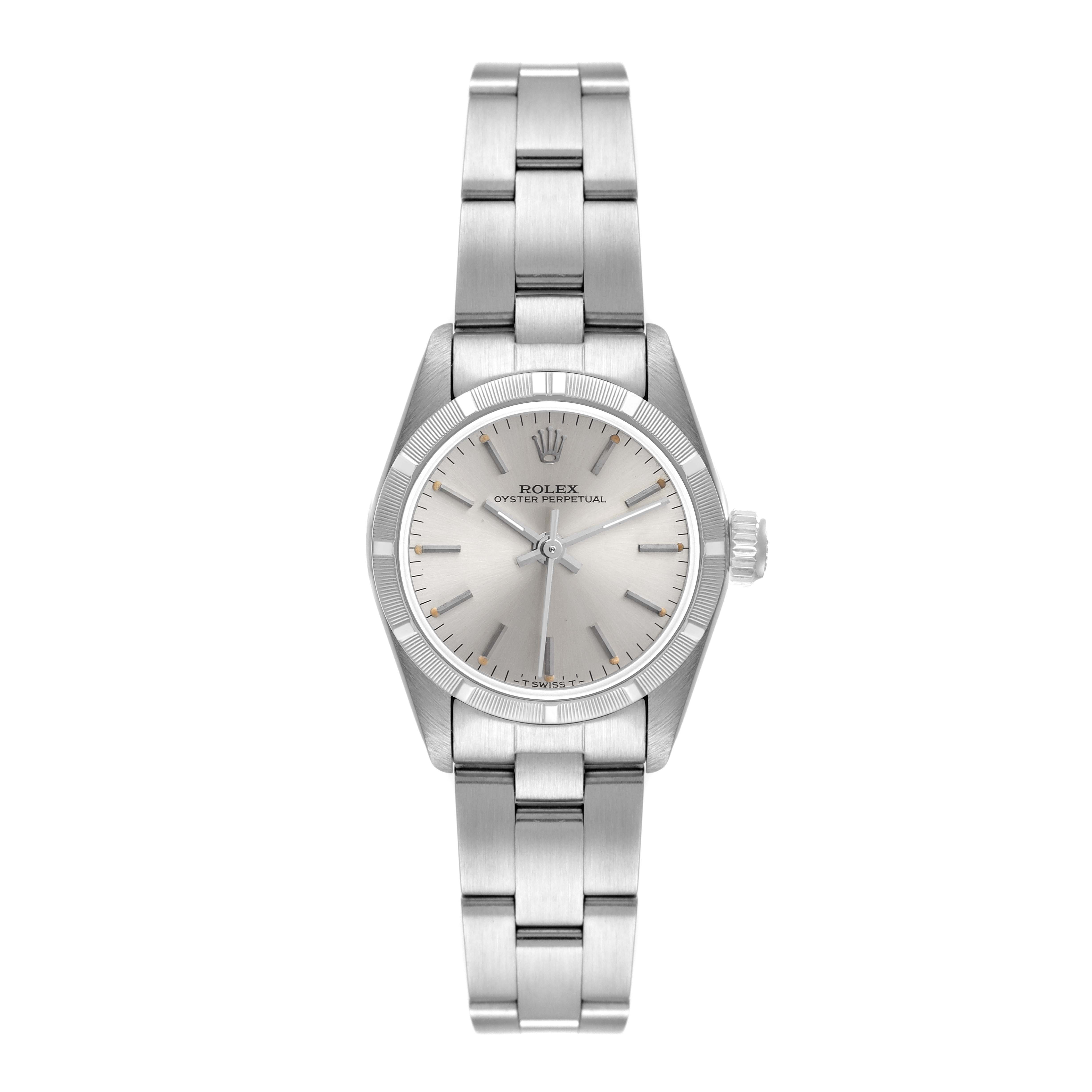 This Rolex Oyster Perpetual 67230 Women
s Stainless Steel Silver Dial 67230 Women
s Stainless Steel Silver Dial watch is shown from a straight-on angle, displaying the face, bezel, crown, and stainless steel bracelet.