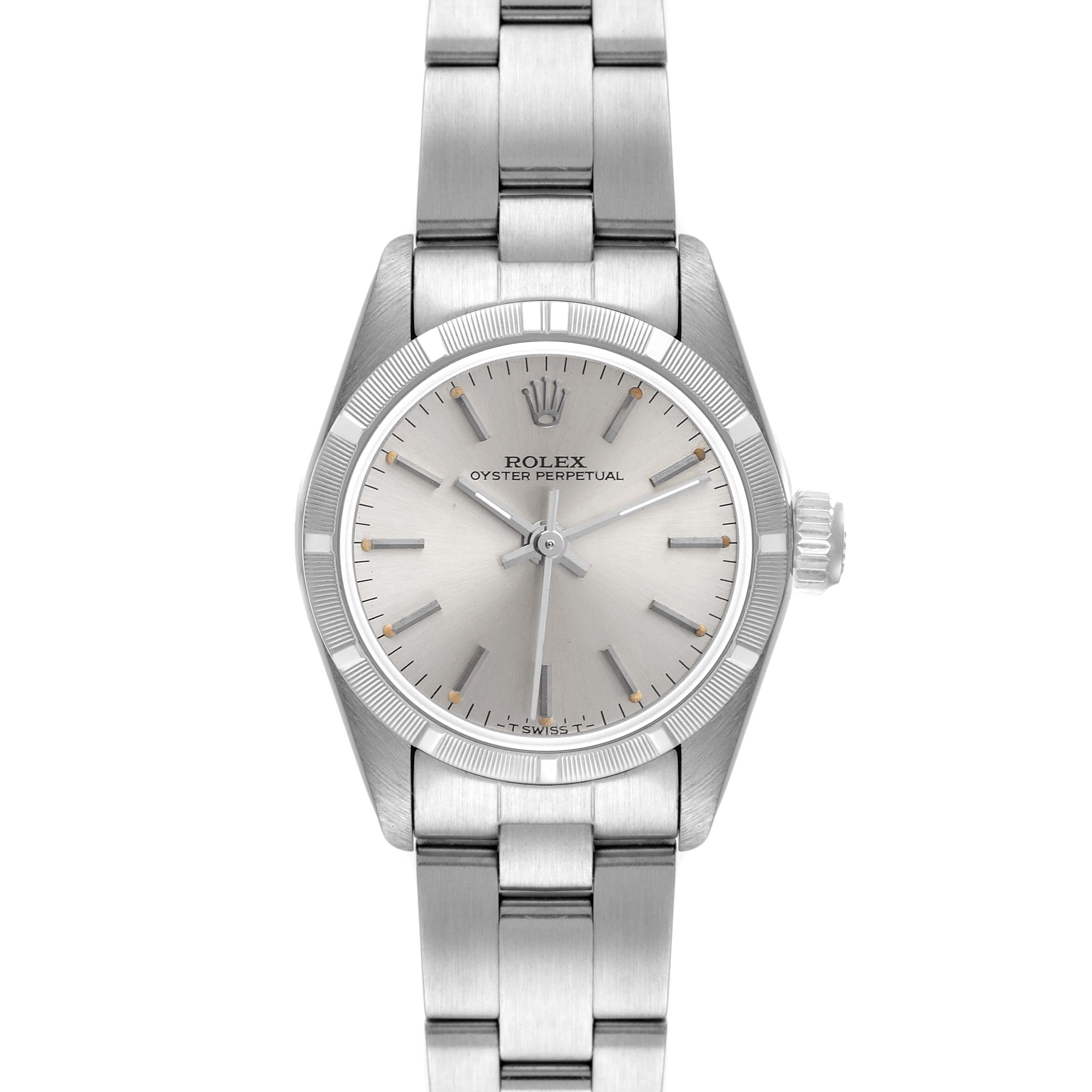 The image shows a front view of a Rolex Oyster Perpetual 67230 Women
s Stainless Steel Silver Dial 67230 Women
s Stainless Steel Silver Dial watch, including the face, bezel, crown, and part of the bracelet.