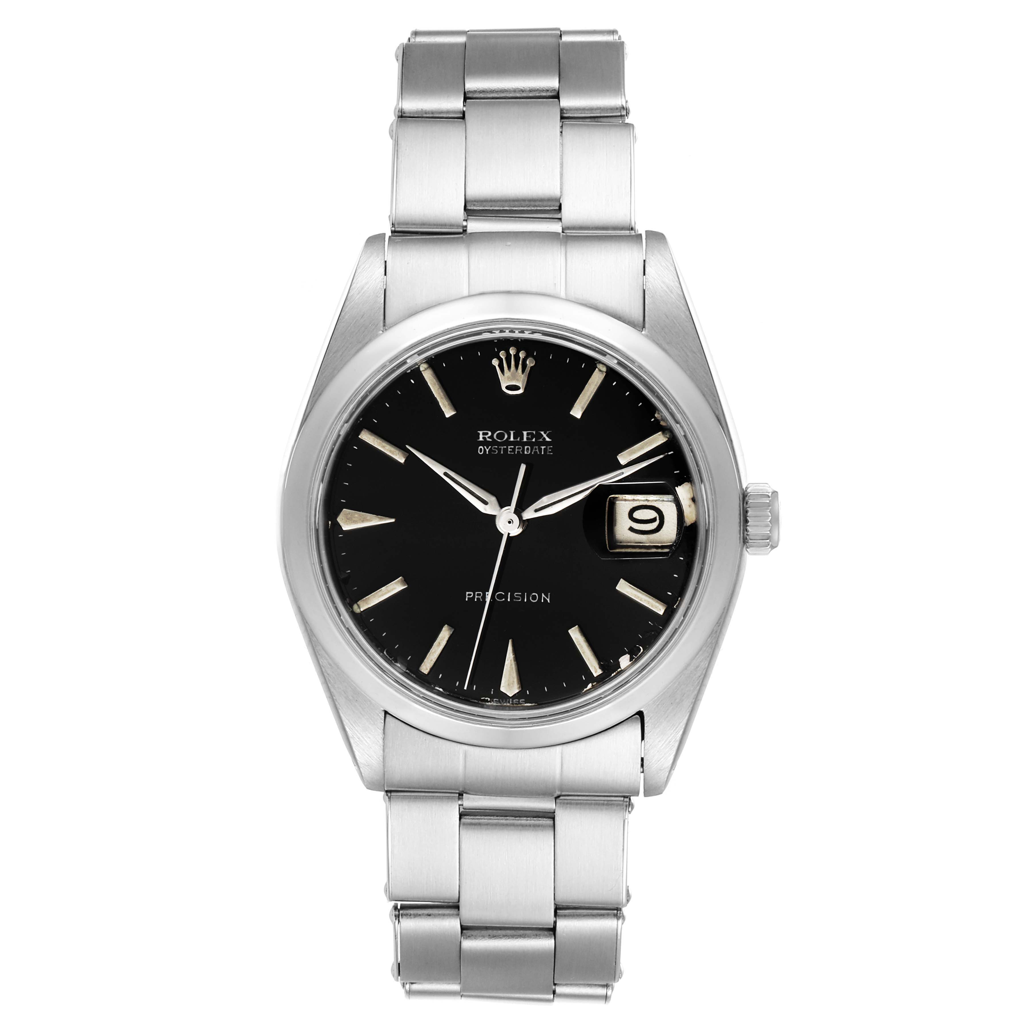 The image shows a front view of a Rolex Vintage Collection 6694 Men's Stainless Steel Black Dial 6694 Men's Stainless Steel Black Dial Oysterdate Precision watch, highlighting the dial, case, crown, and bracelet.