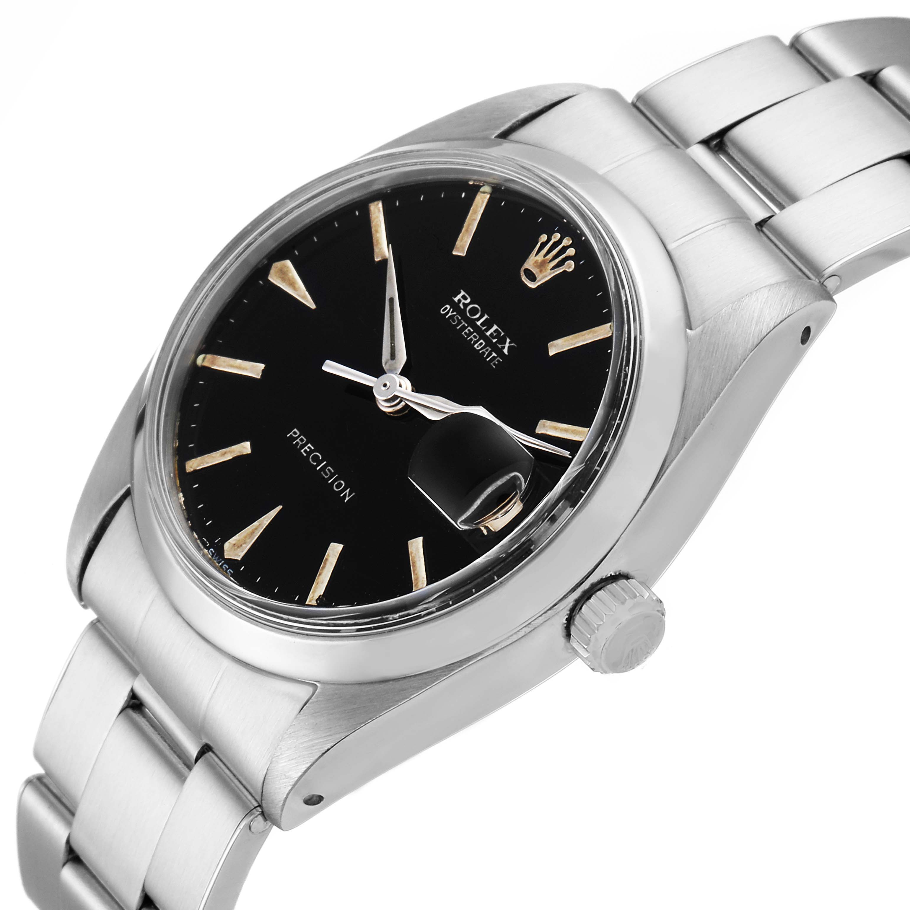 This image shows a side view of the Rolex Vintage Collection 6694 Men's Stainless Steel Black Dial 6694 Men's Stainless Steel Black Dial watch, highlighting its black dial, bracelet, and crown.