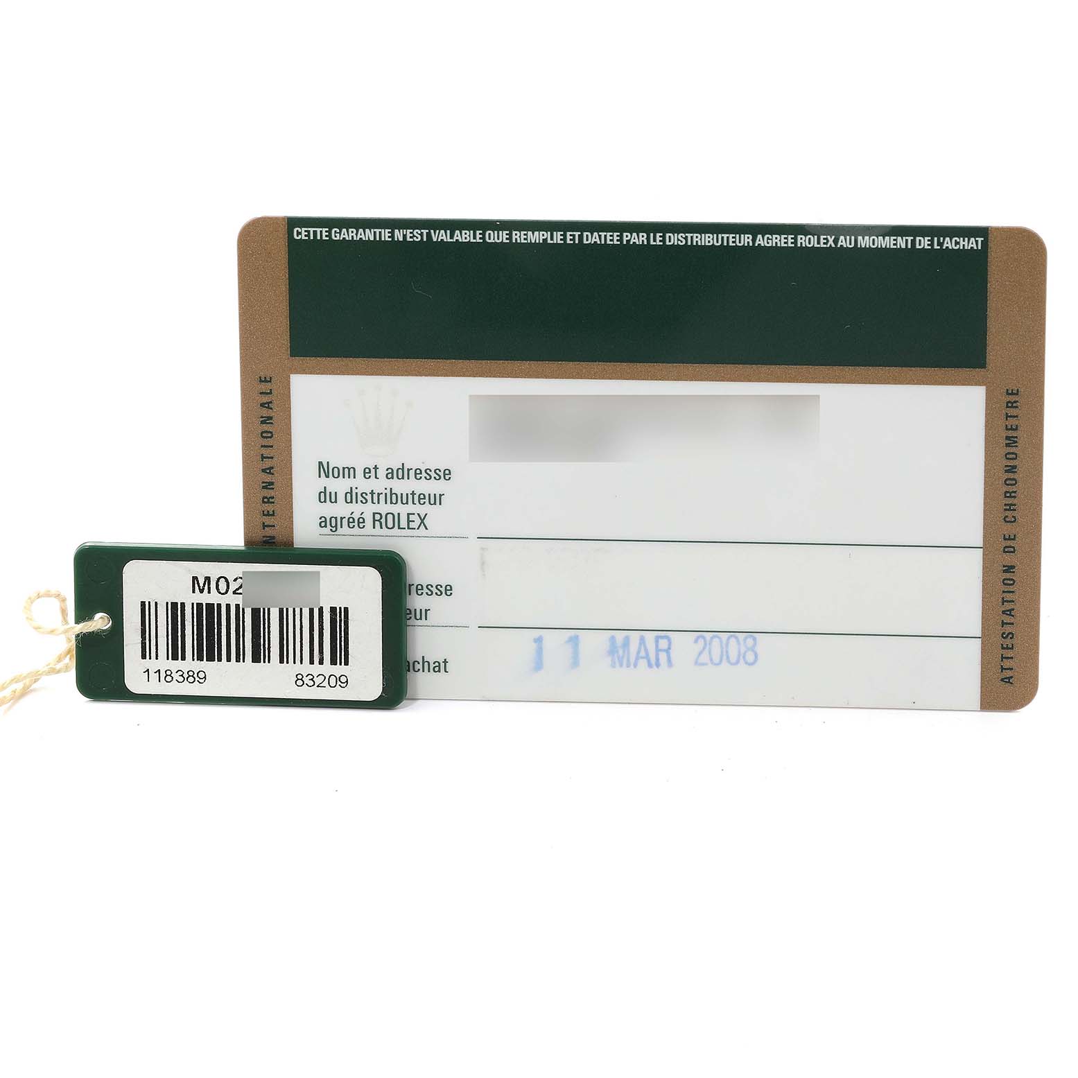 The image shows a warranty card and a barcode tag for a Rolex President 118389 Men's White Gold Mother of Pearl Dial 118389 Men's White Gold Mother of Pearl Dial model at a straight-on angle.