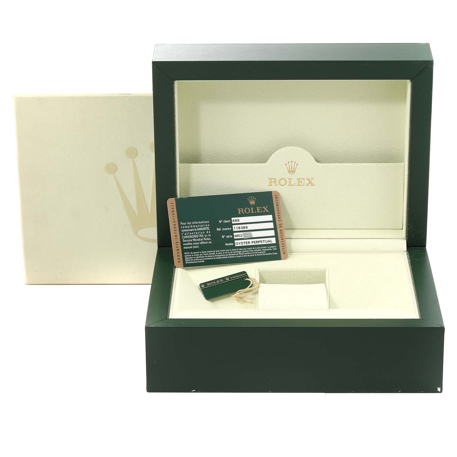 The image shows the packaging and accessories for the Rolex President 118389 Men's White Gold Mother of Pearl Dial 118389 Men's White Gold Mother of Pearl Dial model, including the box, guarantee card, and tag.