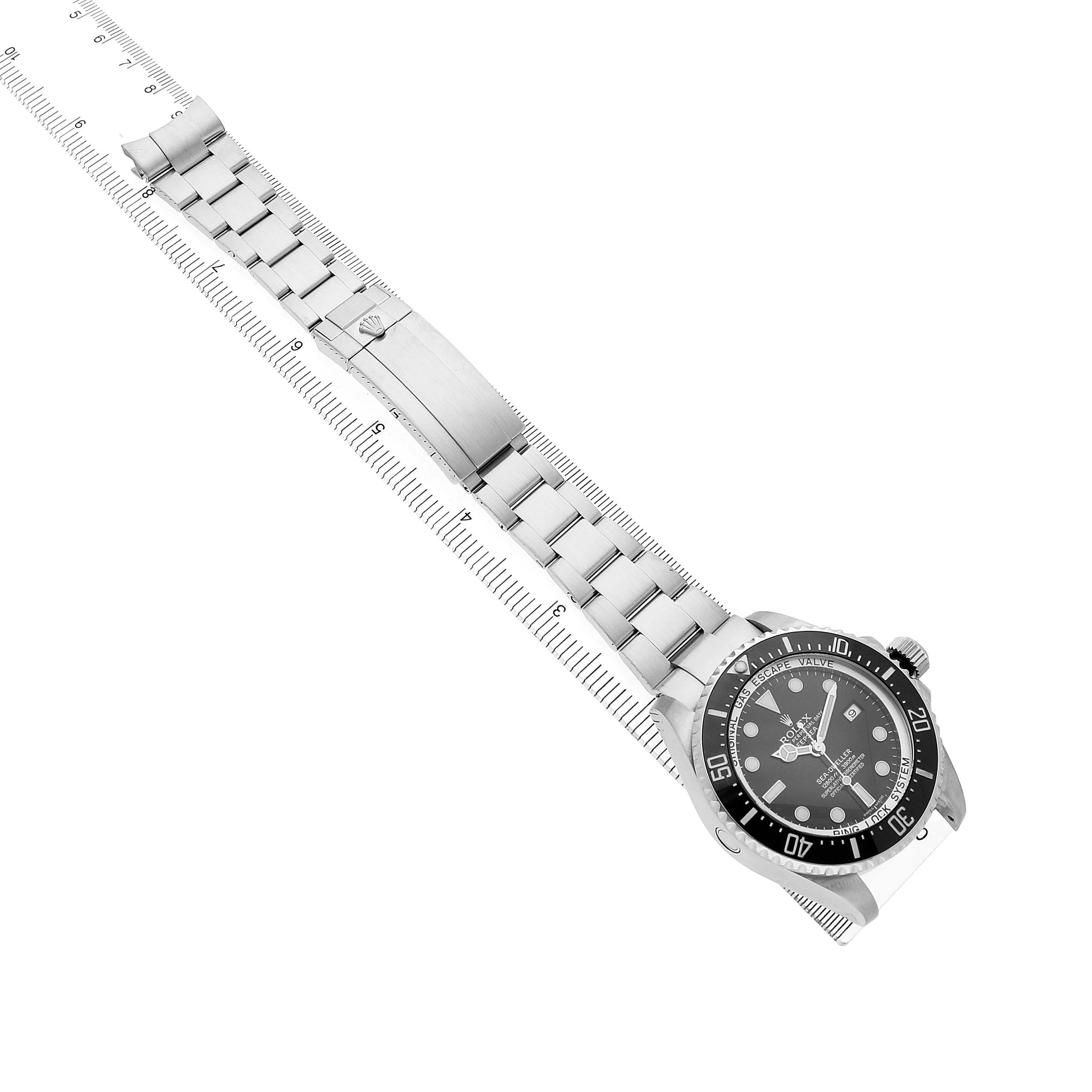 The Rolex Sea-Dweller 116660 Men's Stainless Steel Black Dial watch is shown from an overhead angle, displaying its bracelet, clasp, and face.