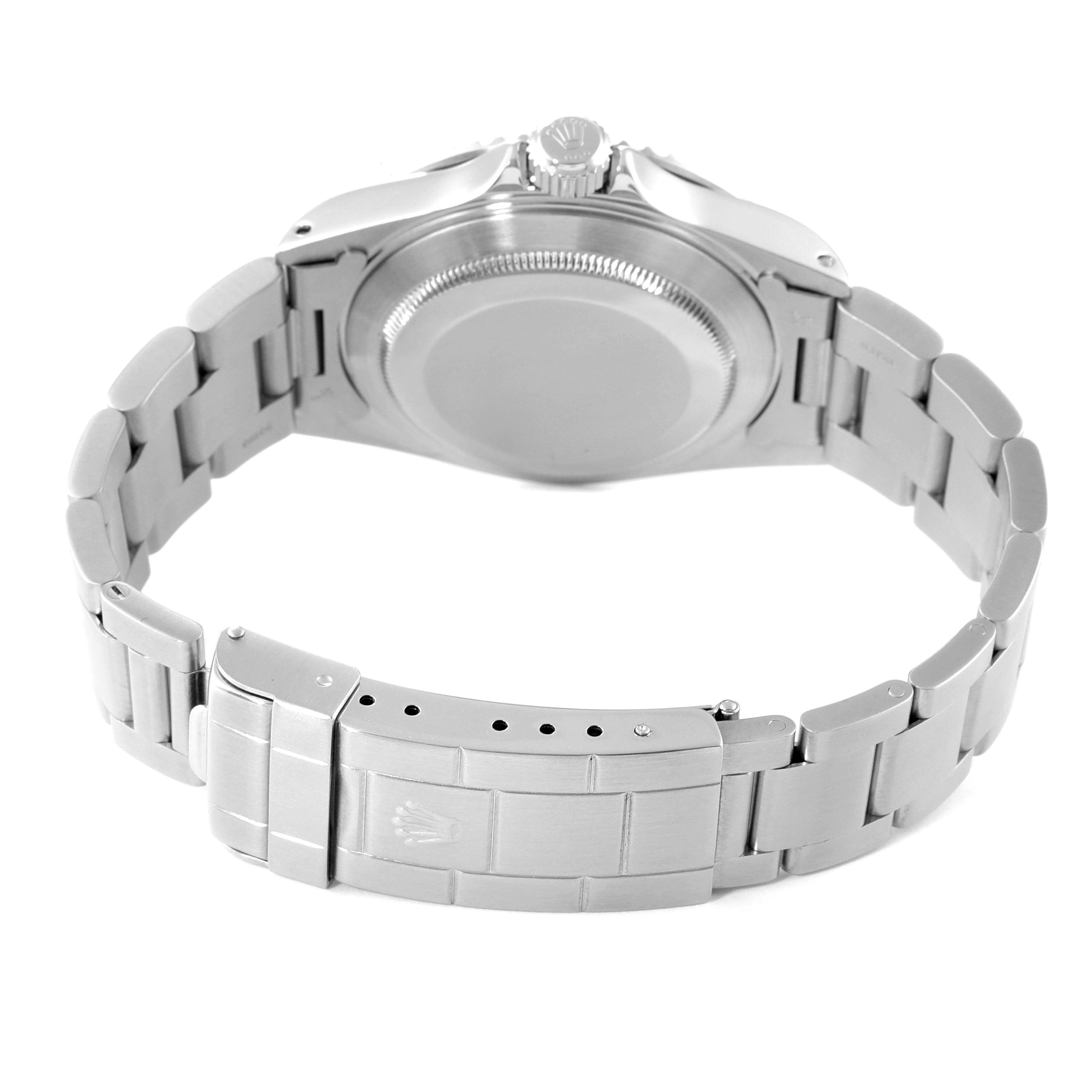 The image shows the backside of a Rolex Submariner 14060 Men
s Stainless Steel Black Dial 14060 Men
s Stainless Steel Black Dial watch, highlighting the bracelet, clasp, and case back.