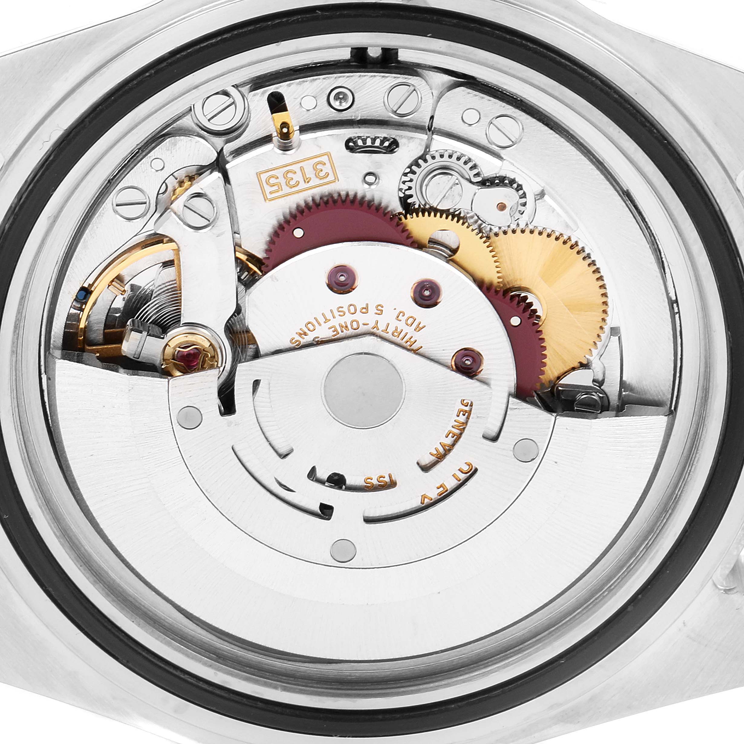 The image shows a close-up of the Rolex Submariner 16613 Men's Steel and Gold (two tone) Black Dial 16613 Men's Steel and Gold (two tone) Black Dial's movement mechanism from the back, highlighting the gears and intricate parts.