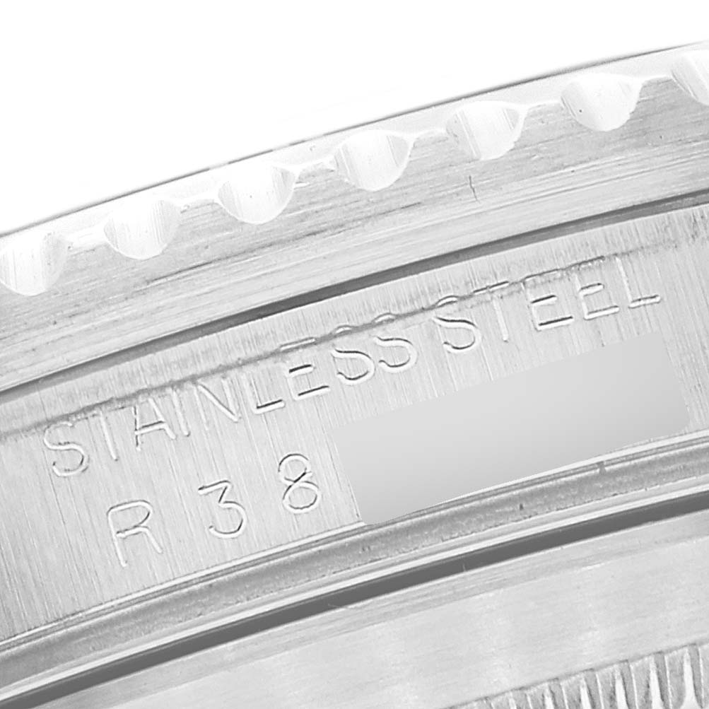 The image shows a close-up view of the stainless steel case back of a Rolex Submariner 168000 Men's Stainless Steel Black Dial 168000 Men's Stainless Steel Black Dial watch.