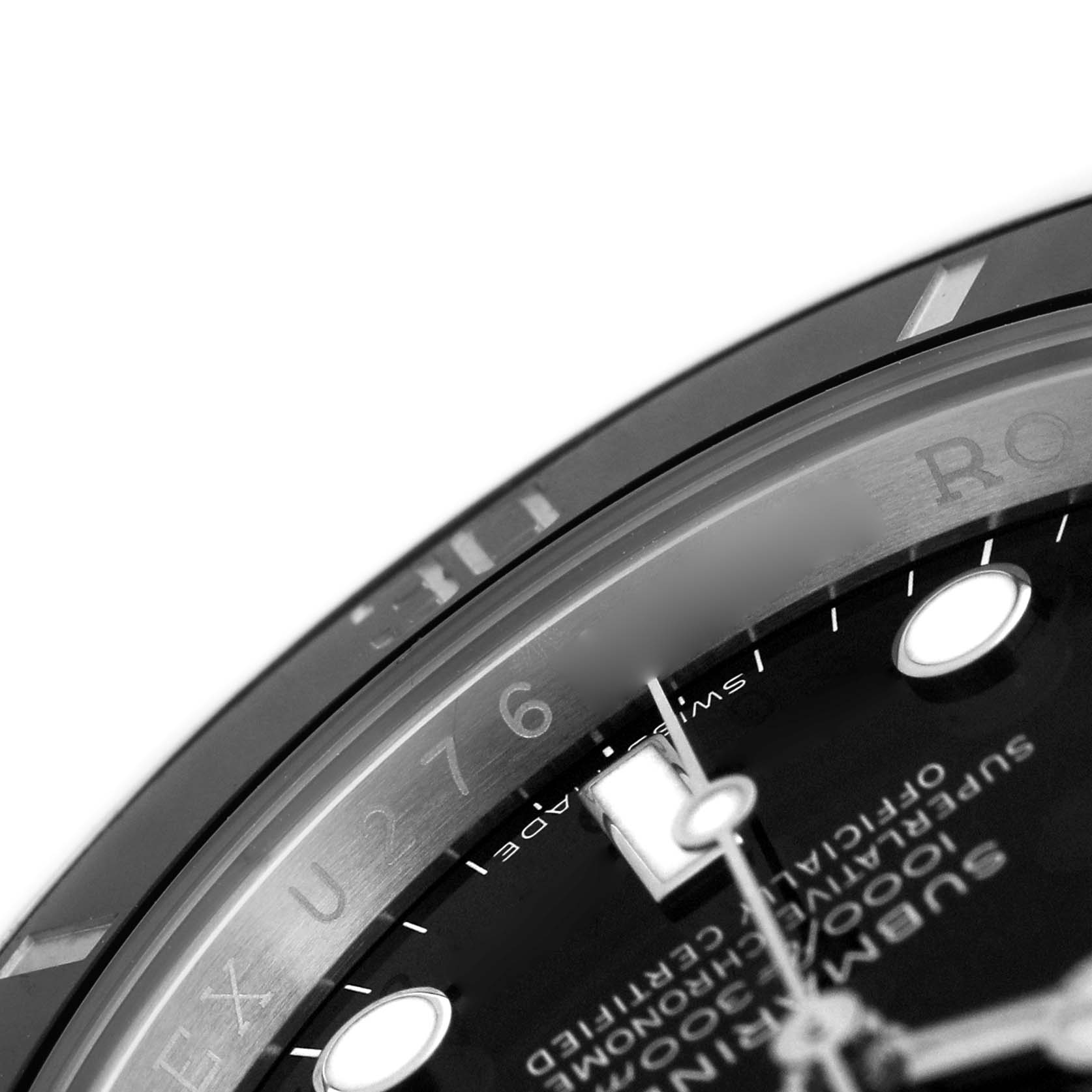The image shows a close-up angle of the Rolex Submariner 116610 Men's Stainless Steel Black Dial, focusing on the bezel, part of the dial, and engraving.