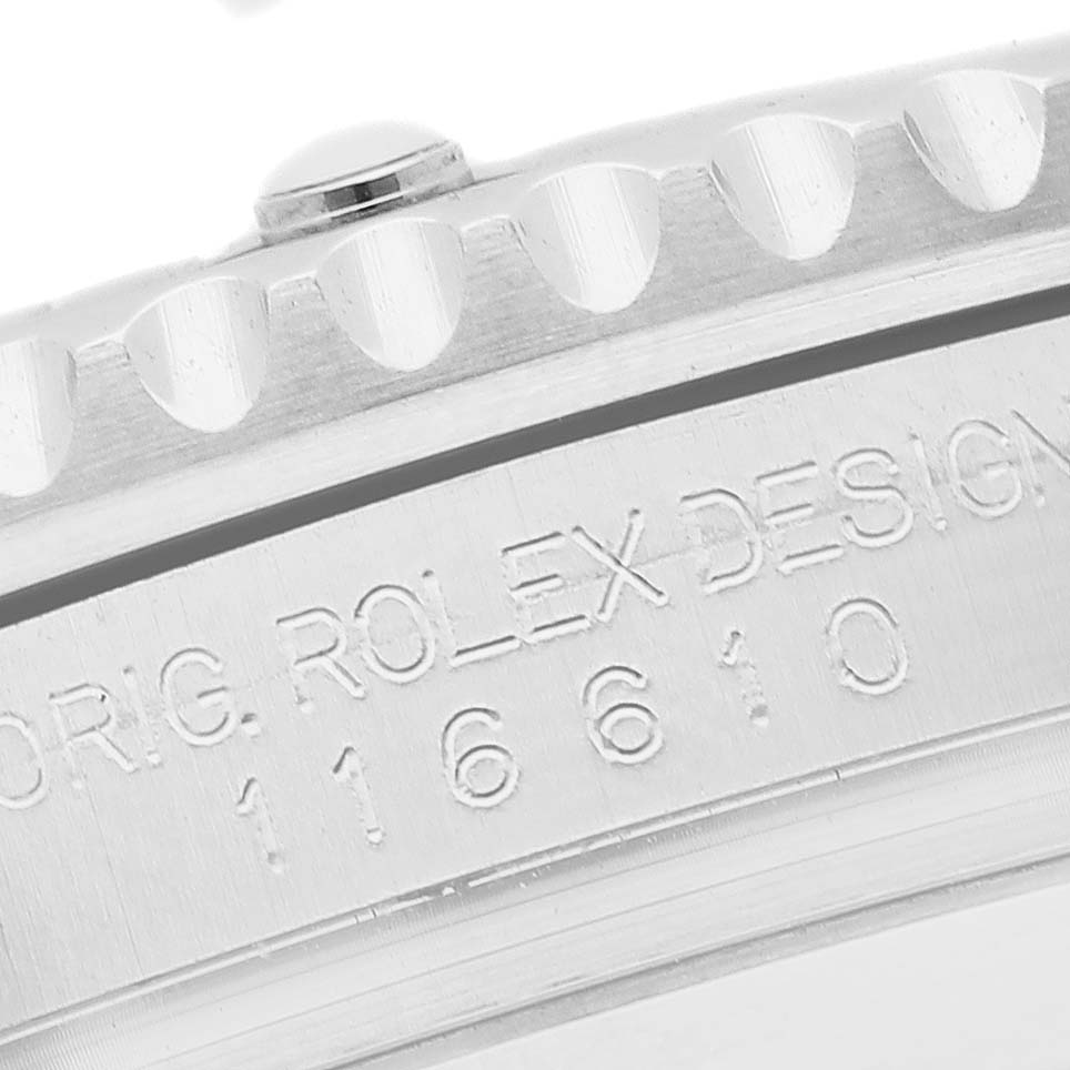The image shows a close-up of the case side of the Rolex Submariner 116610 Men's Stainless Steel Black Dial, revealing the model number engraving.