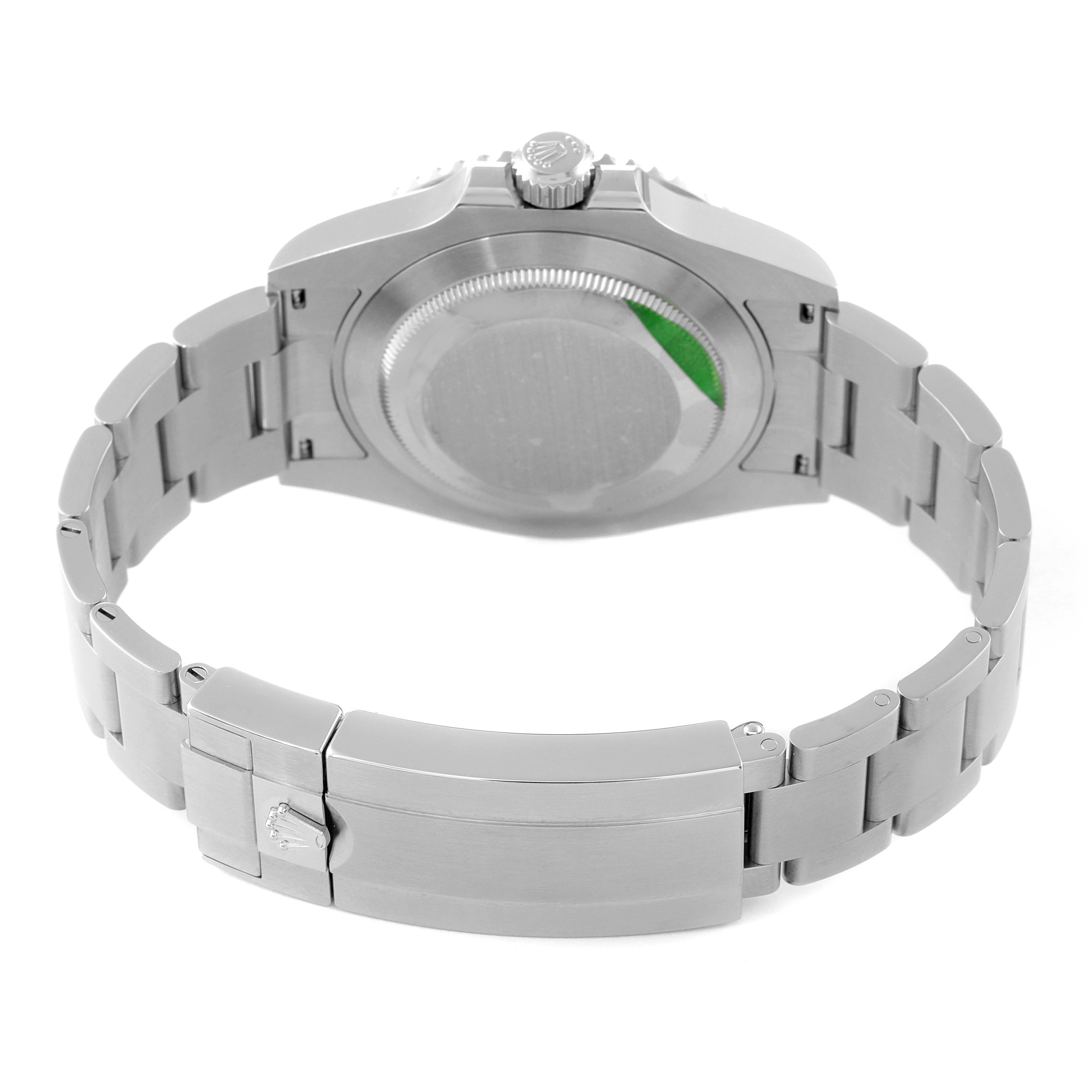 The image shows the back casing and bracelet of the Rolex Submariner 126610LV Men
s Stainless Steel Black Dial 126610LV Men
s Stainless Steel Black Dial watch at an angle revealing the clasp and links.