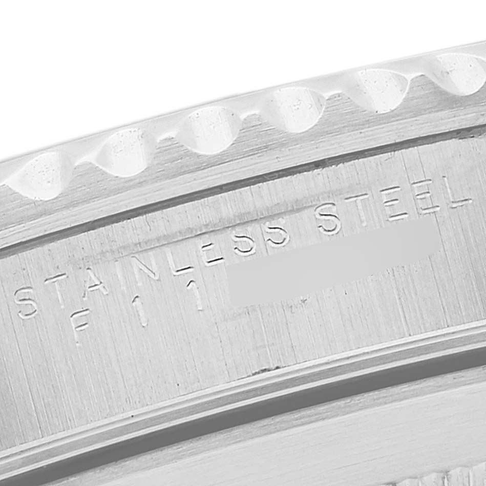 This image shows a close-up of the stainless steel engravings on the bezel of a Rolex Submariner 14060M Men
s Stainless Steel Black Dial 14060M Men
s Stainless Steel Black Dial watch.