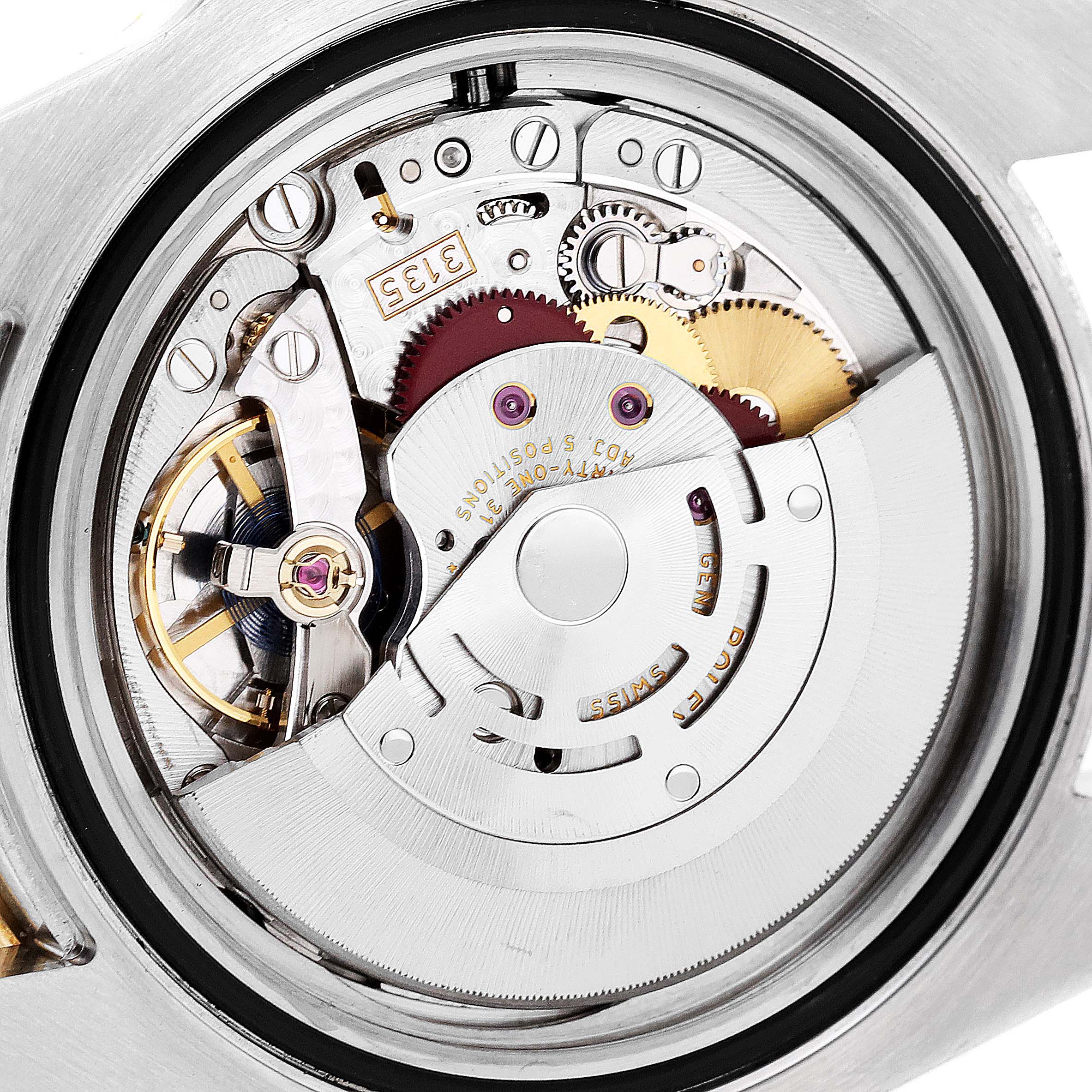 This image shows a close-up of the movement mechanism inside a Rolex Submariner 116613 Men's Steel and Gold (two tone) Black Dial 116613 Men's Steel and Gold (two tone) Black Dial watch.