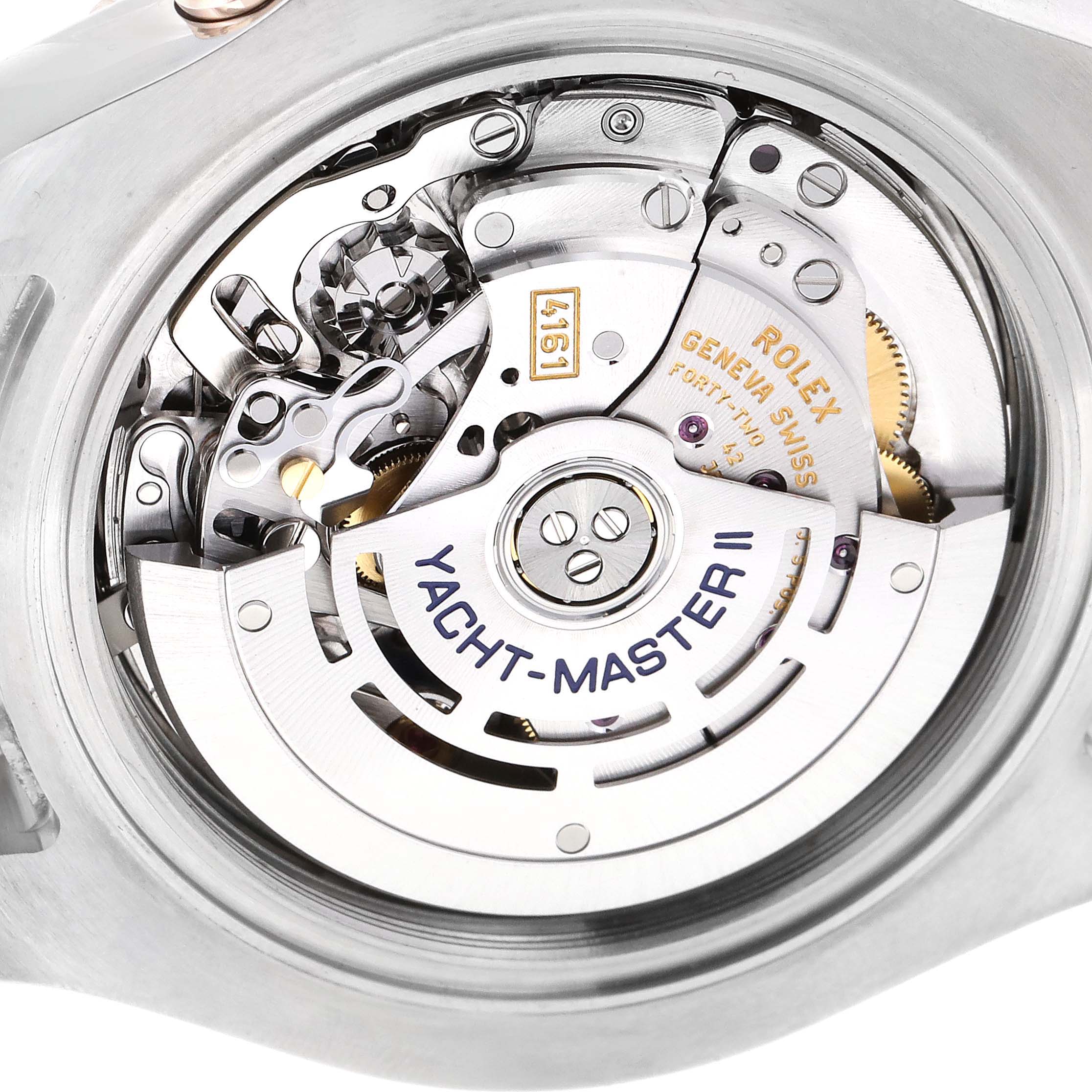 This image shows the inner mechanism of a Rolex Yacht-Master 116681 Men
s Steel and Gold (two tone) White Dial 116681 Men
s Steel and Gold (two tone) White Dial II watch, focusing on its movement components.