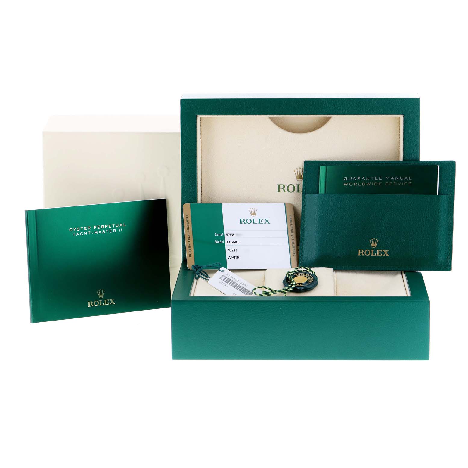 The image shows accessories for a Rolex Yacht-Master 116681 Men
s Steel and Gold (two tone) White Dial 116681 Men
s Steel and Gold (two tone) White Dial model, including the box, manual, and guarantee card.