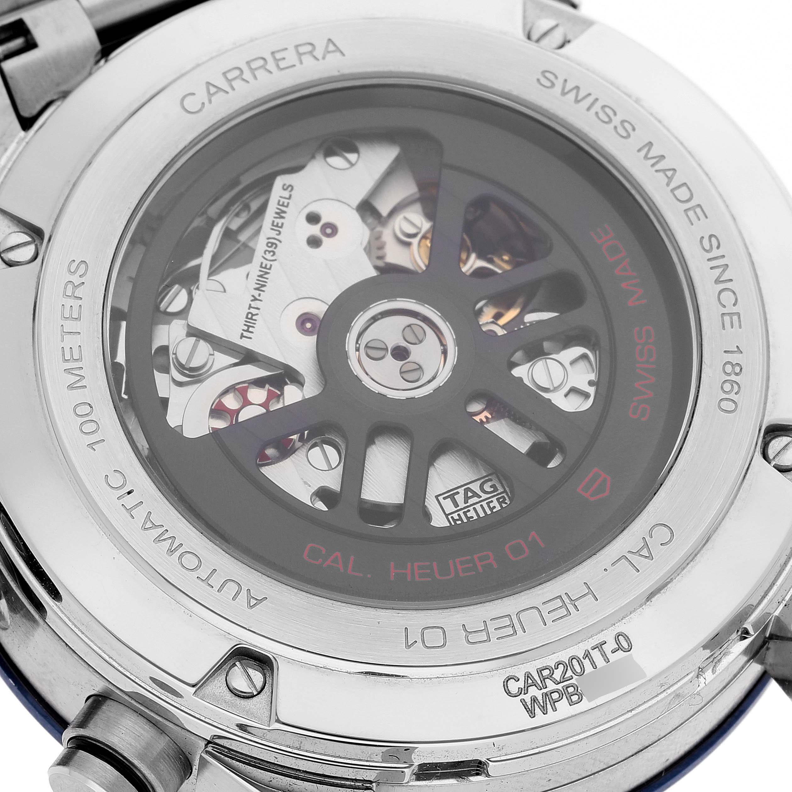 The image shows the back view of the Tag Heuer Carrera CAR201T Men's Stainless Steel Blue Dial CAR201T Men's Stainless Steel Blue Dial watch, revealing its Caliber Heuer 01 movement through a transparent case back.