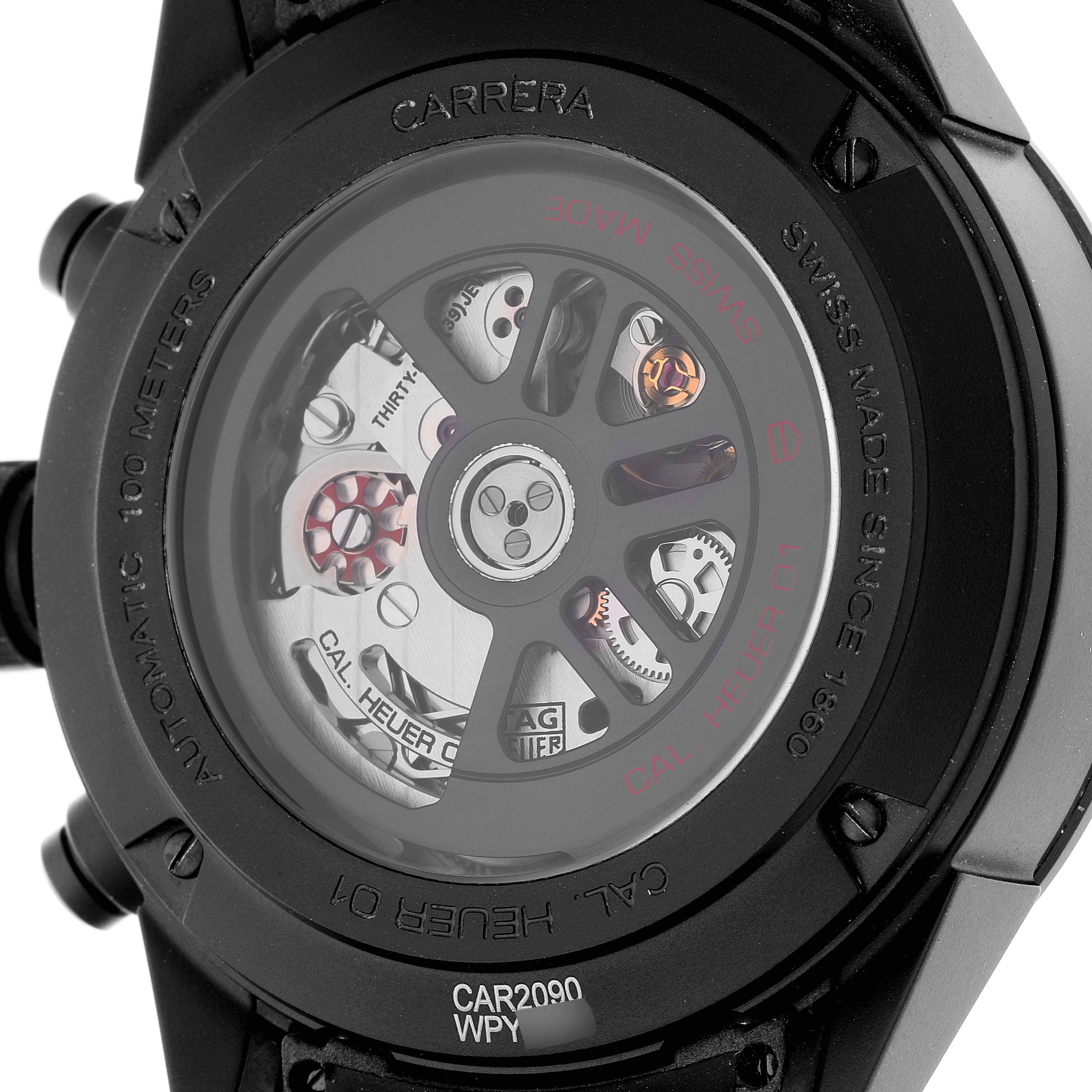 This image shows the back of a Tag Heuer Carrera CAR2090.BH0729 Men's Ceramic Black Dial CAR2090.BH0729 Men's Ceramic Black Dial watch, highlighting the movement and internal mechanisms.